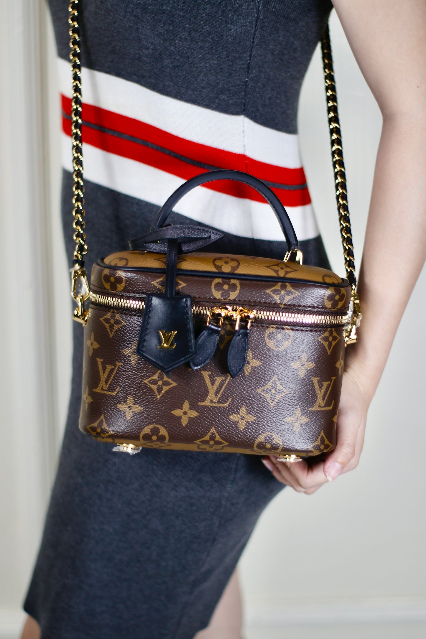 Vanity PM – Monogram Canvas with Black Leather Trim