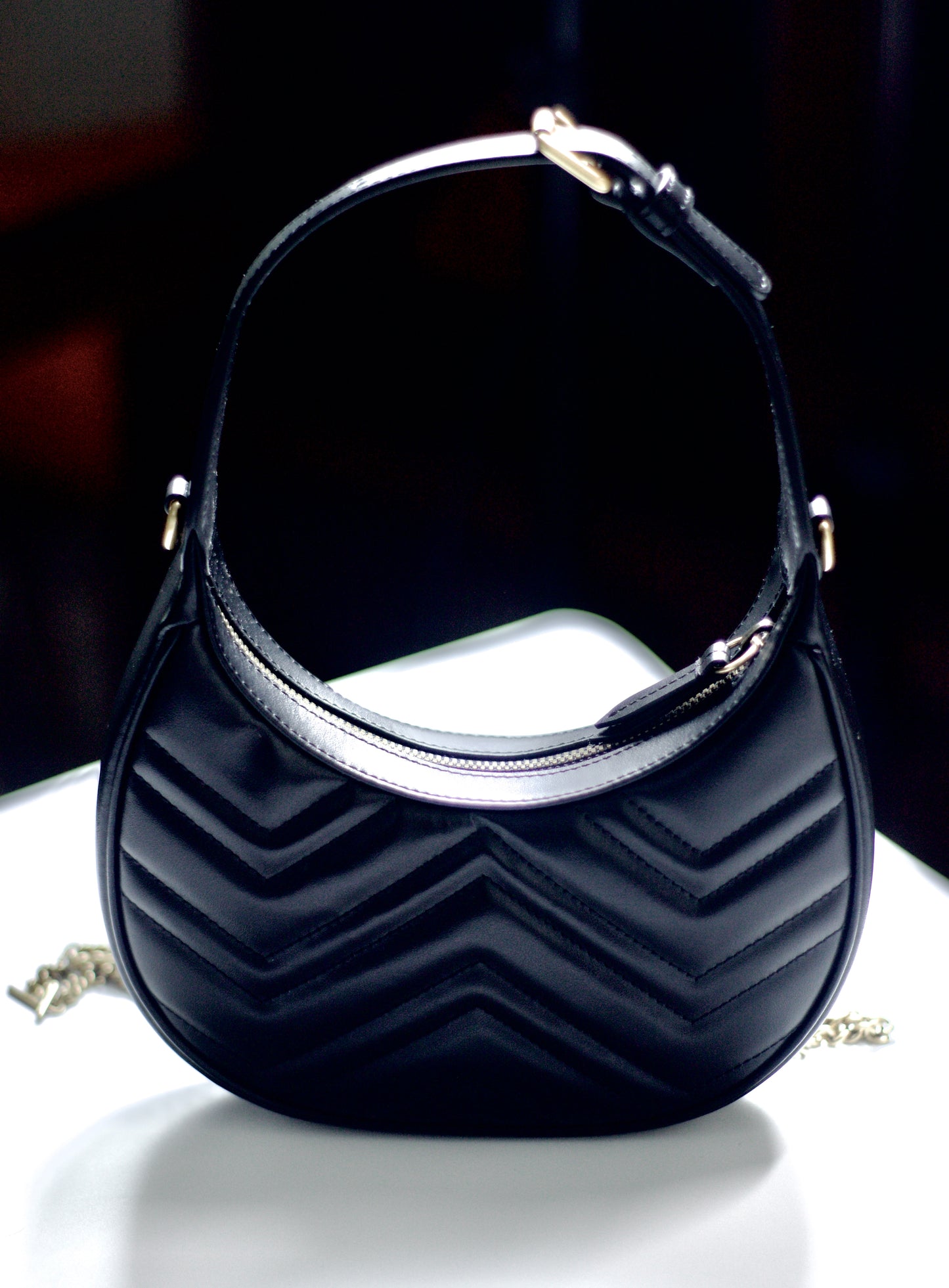 GG Marmont Mini Moon Bag – Black Leather with Antique Gold Hard