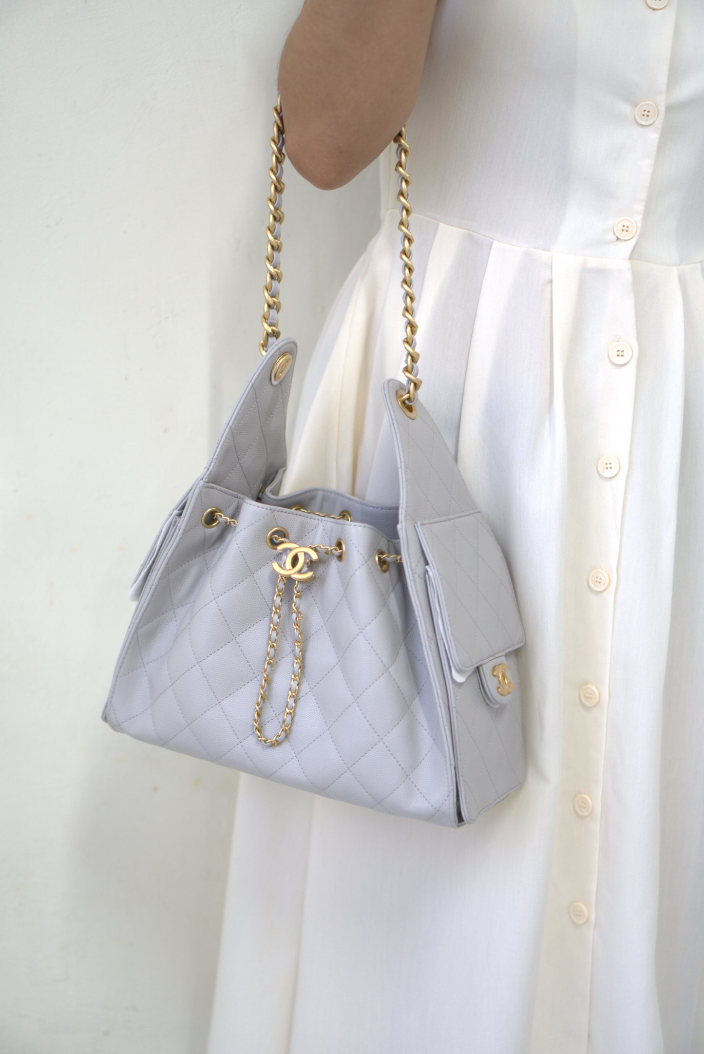 25C Small Drawstring Bag – Light Gray Caviar with Gold Hardware