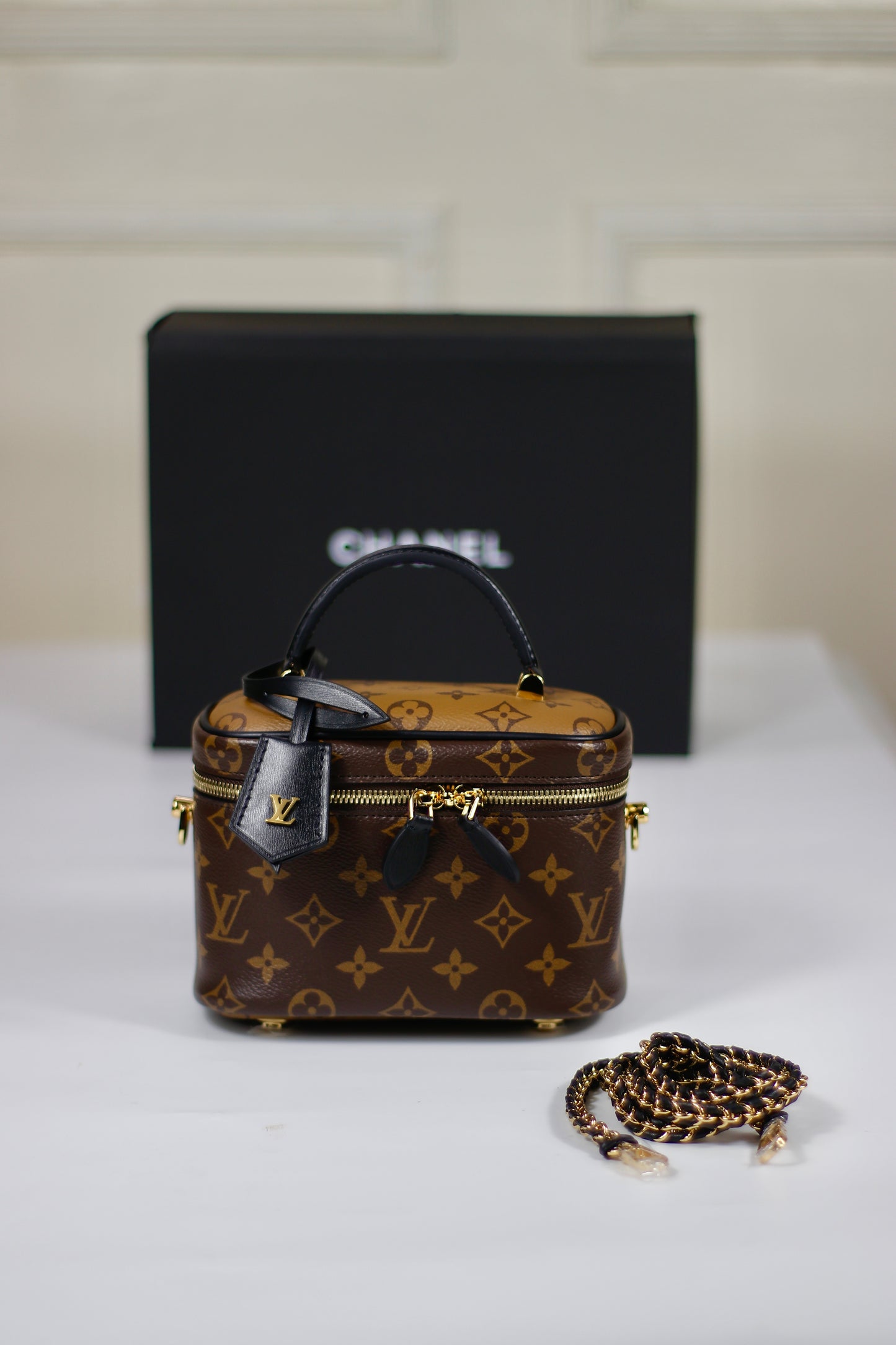 Vanity PM – Monogram Canvas with Black Leather Trim