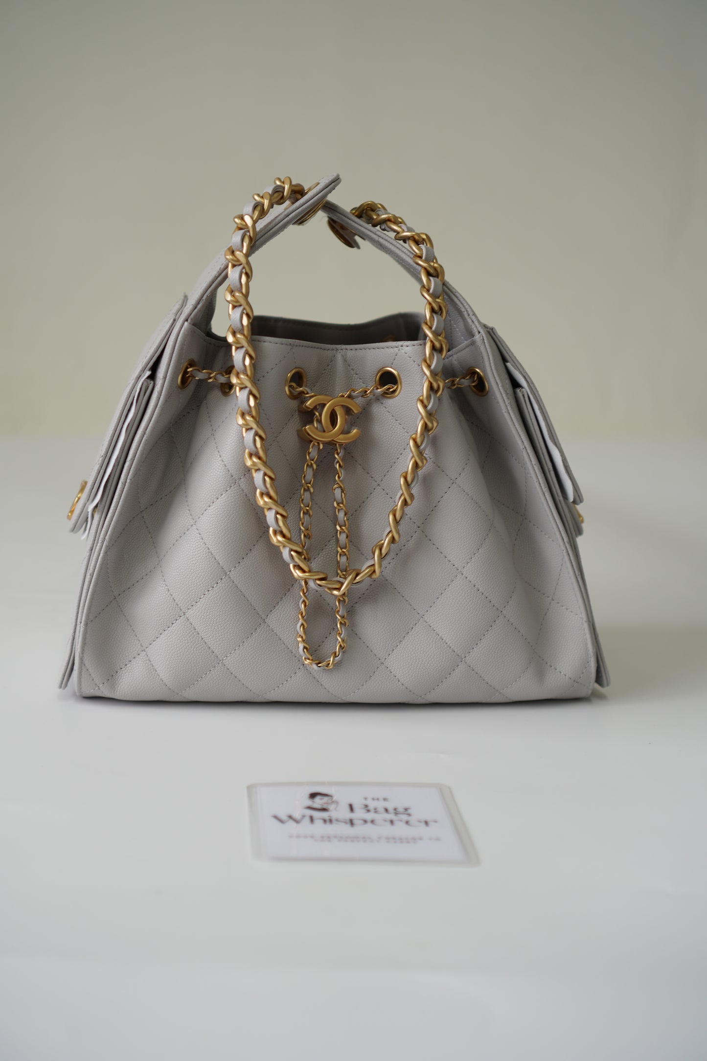 25C Small Drawstring Bag – Light Gray Caviar with Gold Hardware