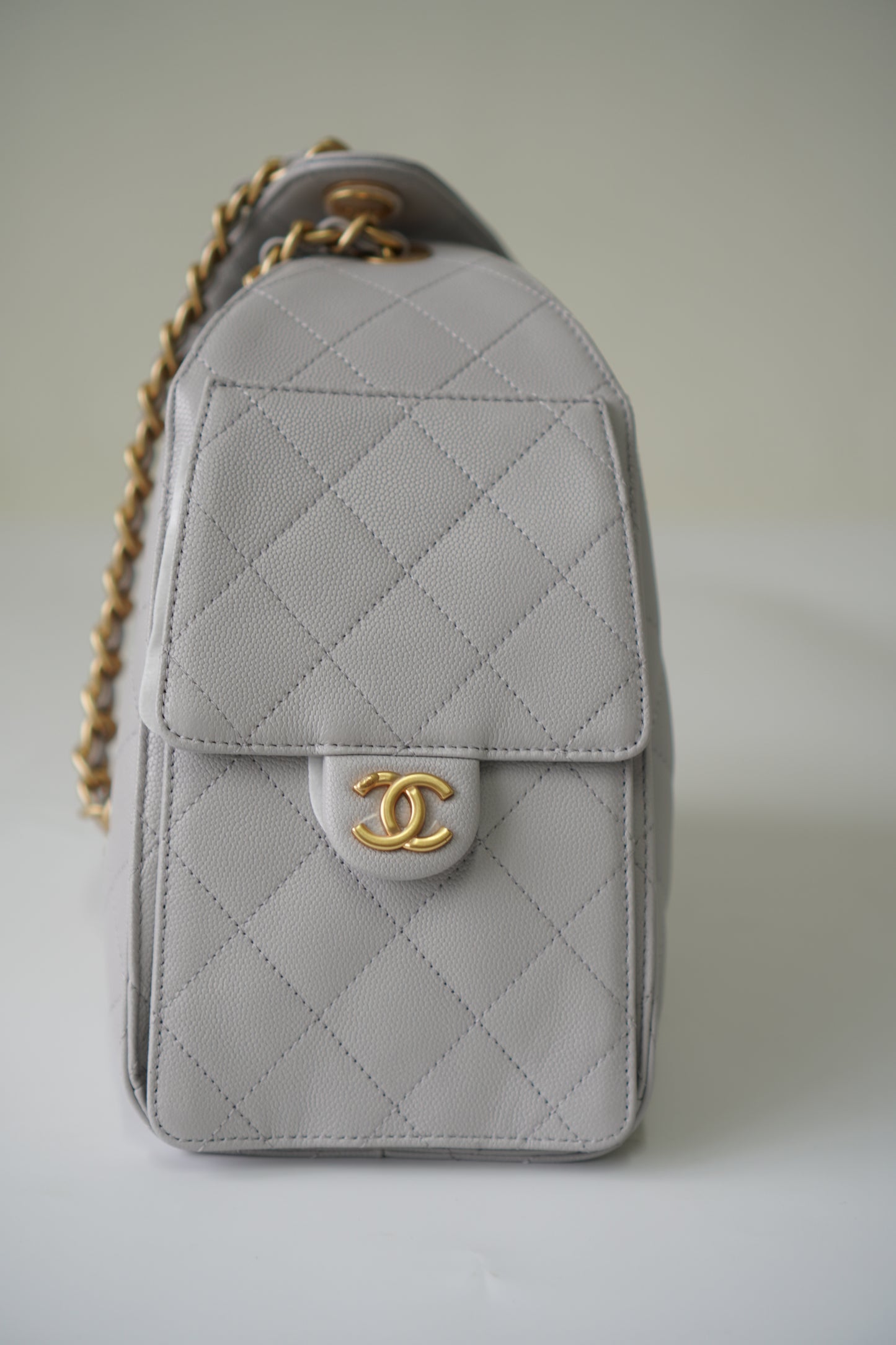 25C Small Drawstring Bag – Light Gray Caviar with Gold Hardware
