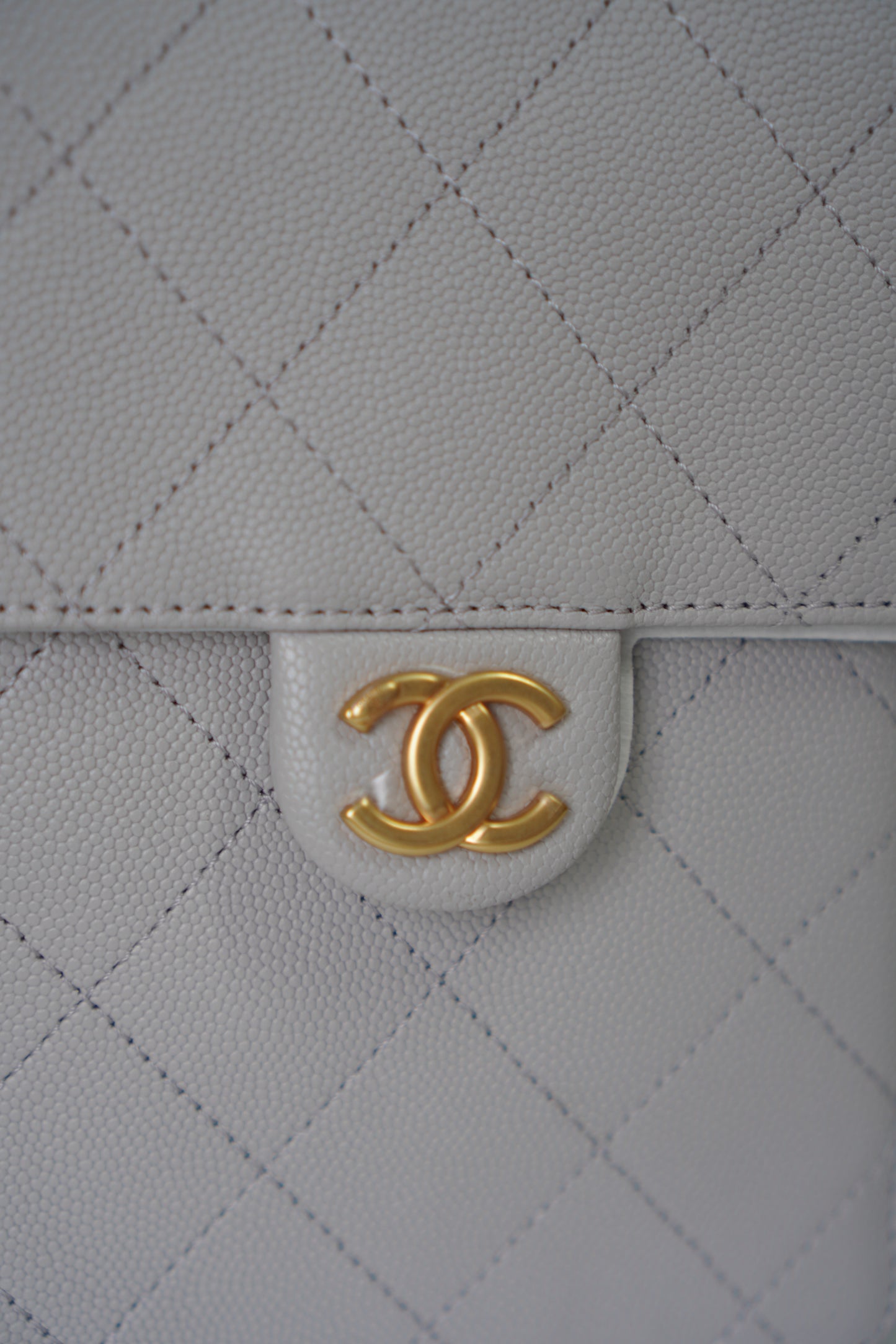 25C Small Drawstring Bag – Light Gray Caviar with Gold Hardware