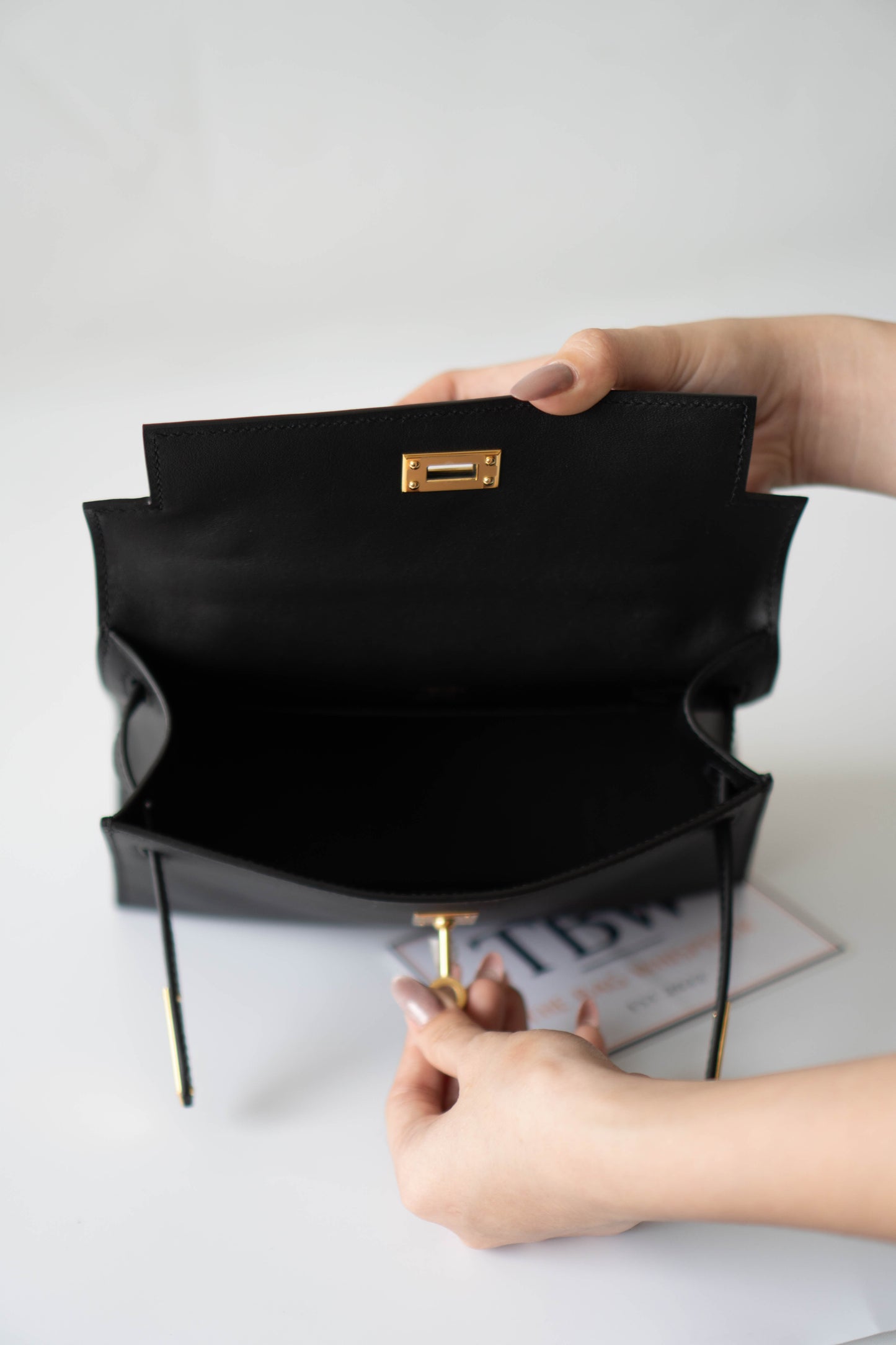 Mini Pochette – Black Swift Leather with Gold Hardware