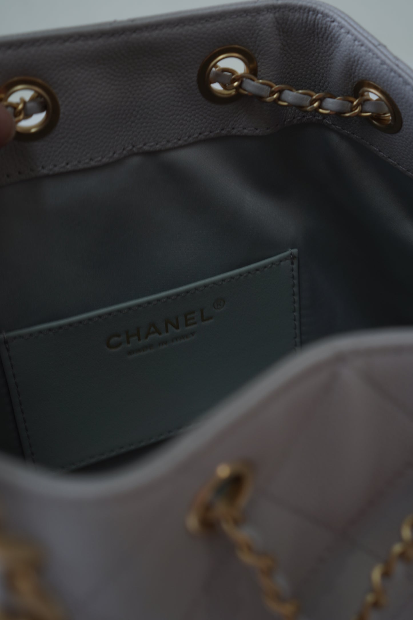 25C Small Drawstring Bag – Light Gray Caviar with Gold Hardware