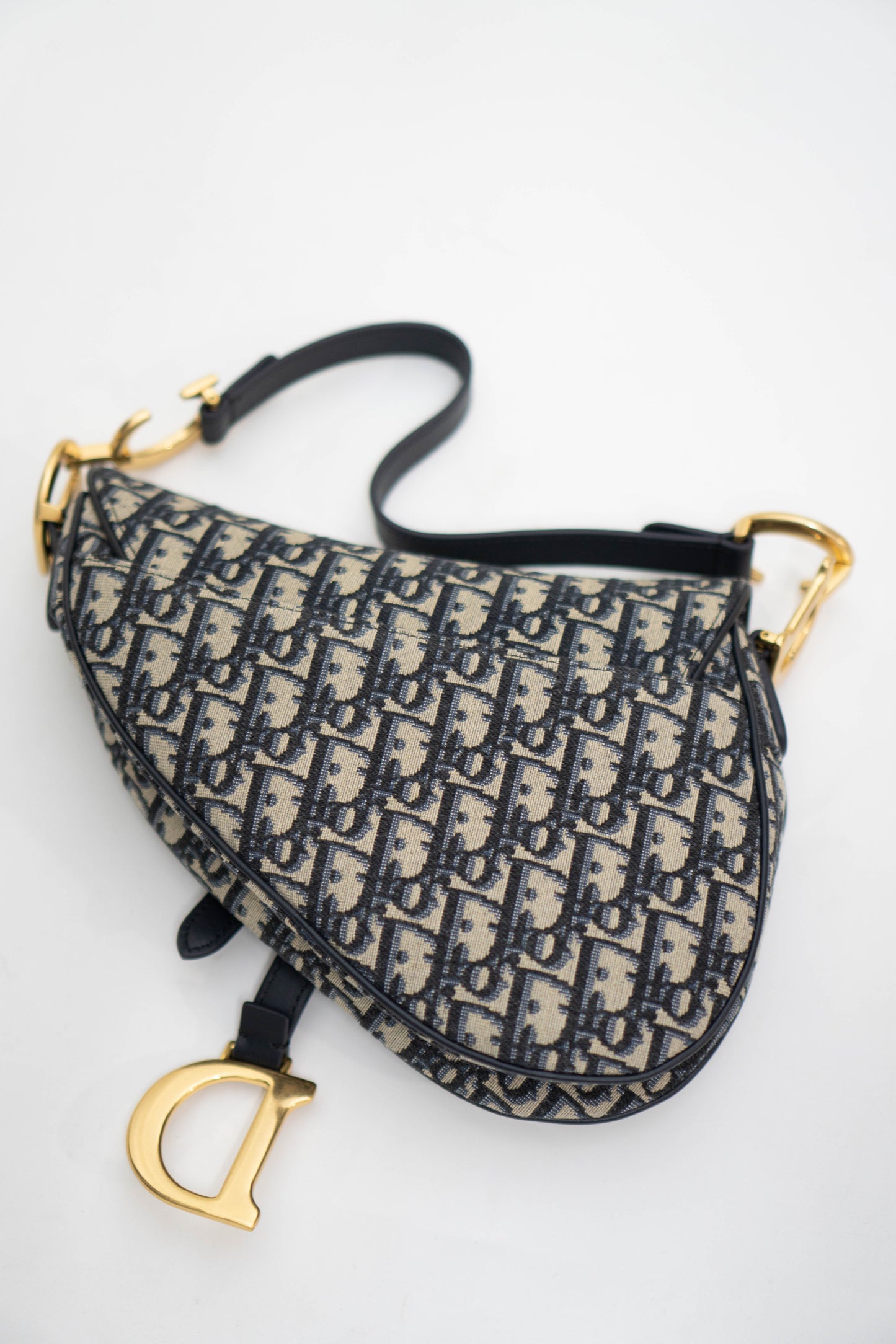Saddle Oblique Jacquard canvas with calfskin leather