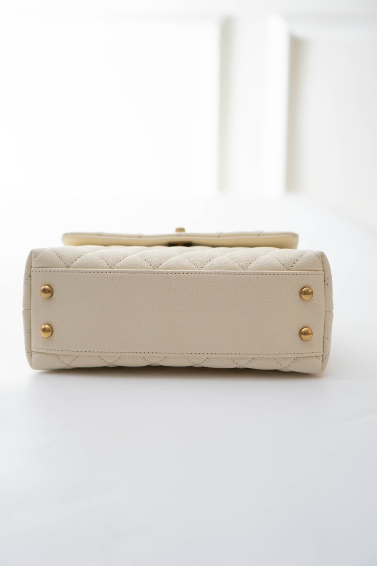 Coco Handle in Ivory or Cream Caviar Leather