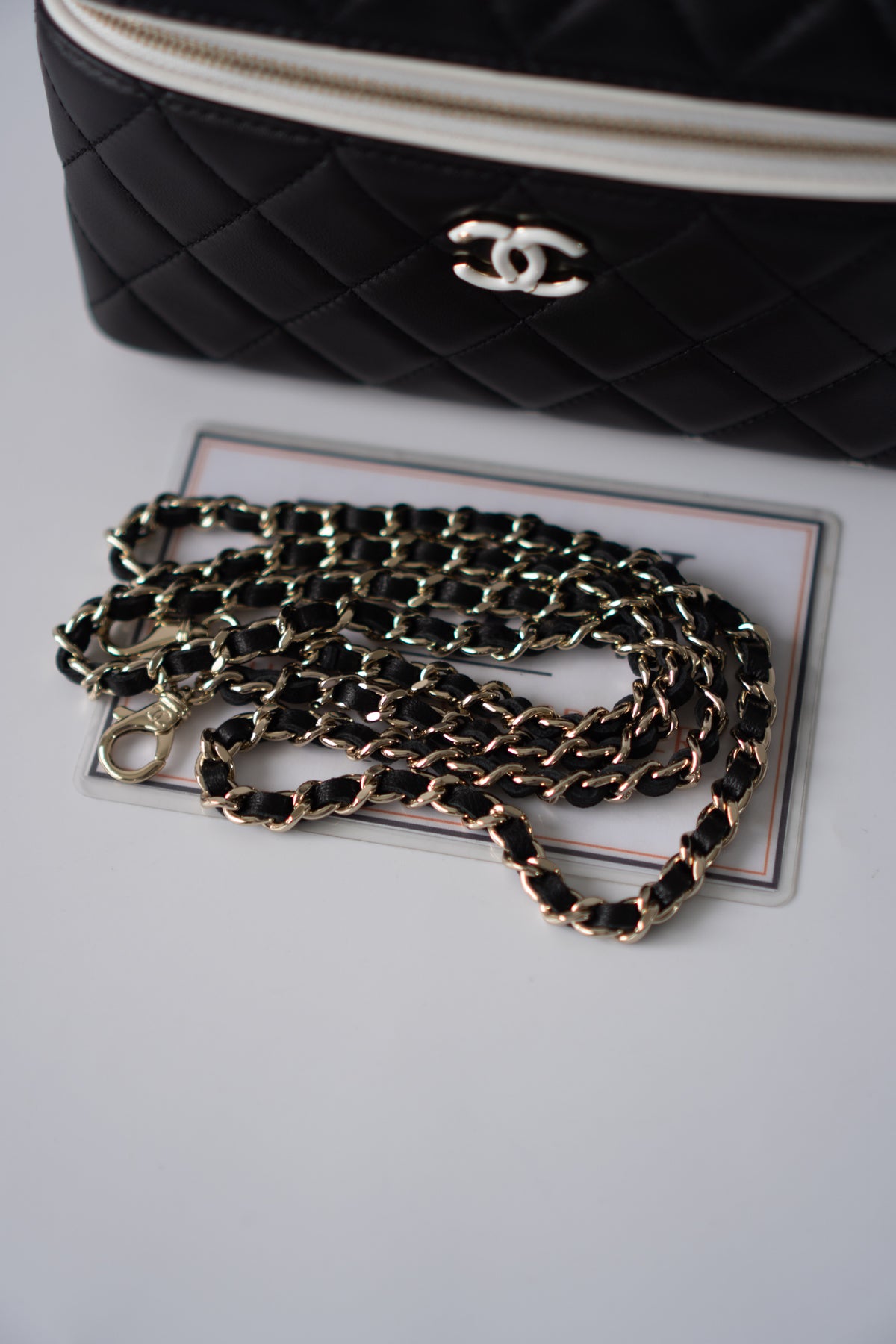 Small Vanity Chain Case – Black Quilted Lambskin with White Piping