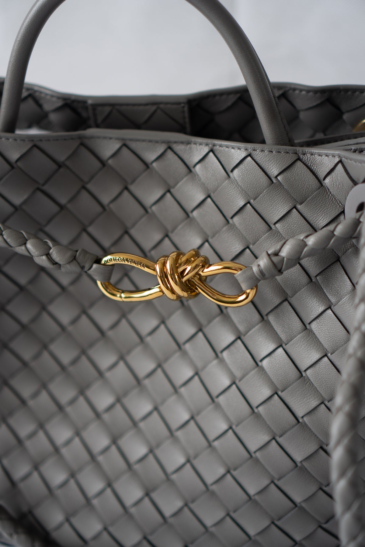 Andiamo – Medium Grey Intrecciato Leather with Gold Hardware