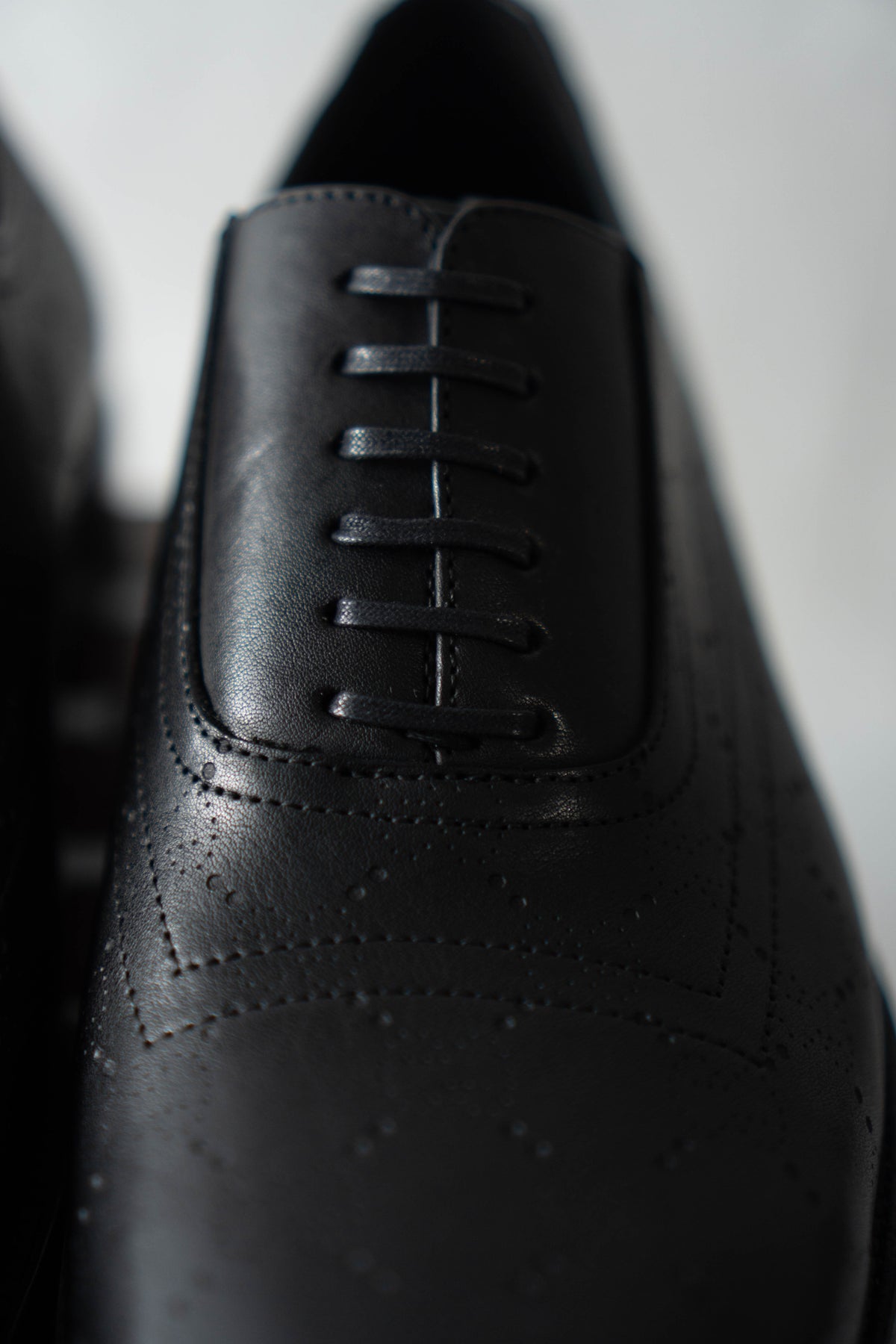 Perforated GG Leather Oxfords – Black