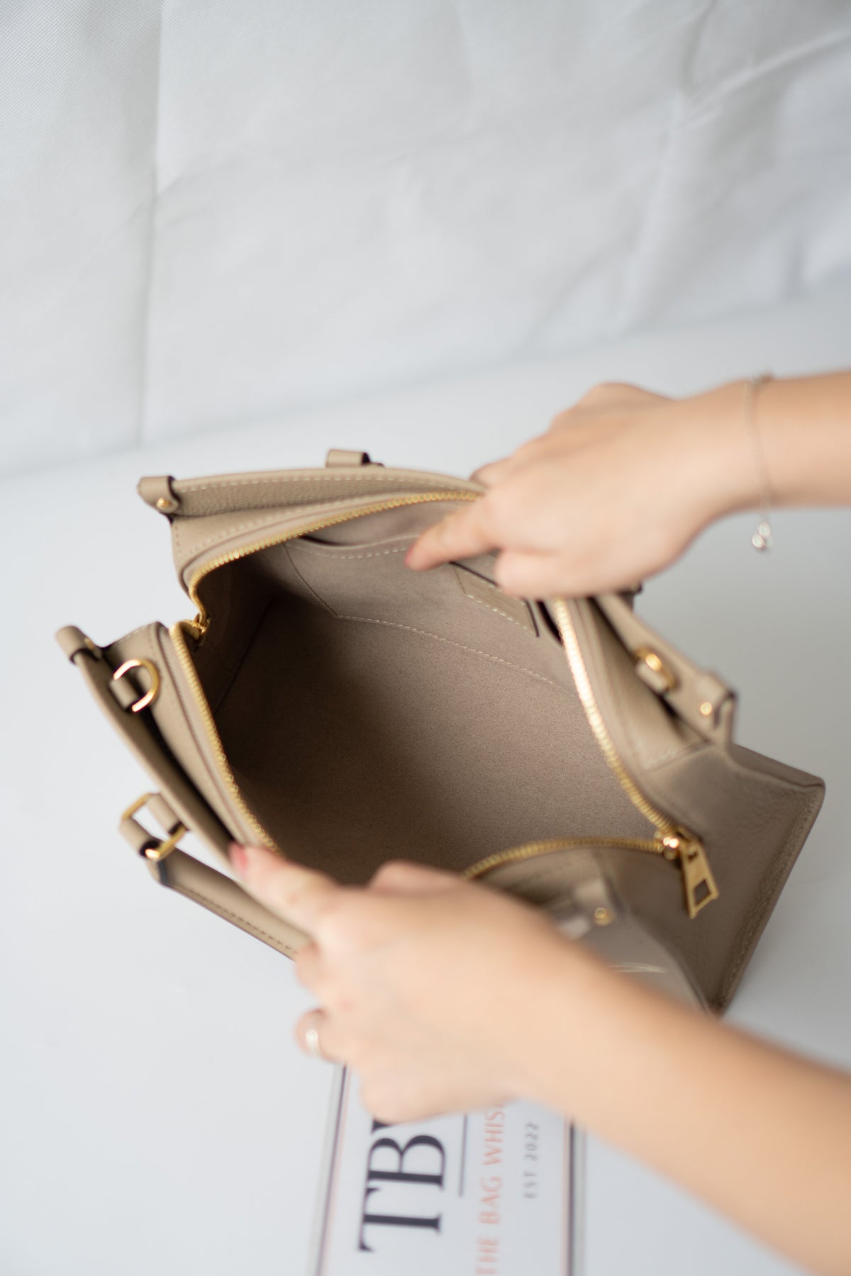 OnTheGo East-West Tote – Tourterelle Monogram Embossed Leather with Gold Hardware