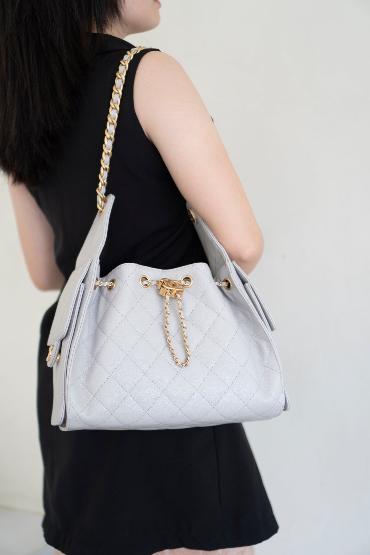 C25 Small Drawstring Chain Bag – Light Gray Caviar Leather with Gold Hardware