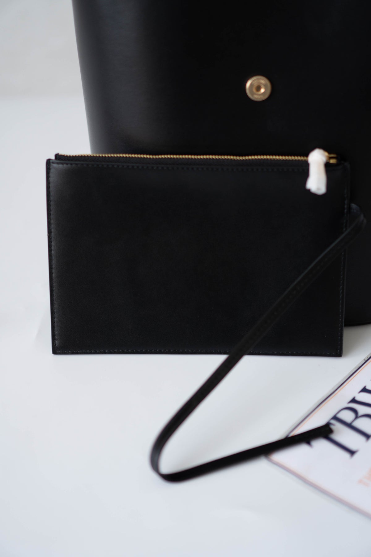 Triomphe Medium Bucket Bag – Black Smooth Calfskin in Gold Hardware