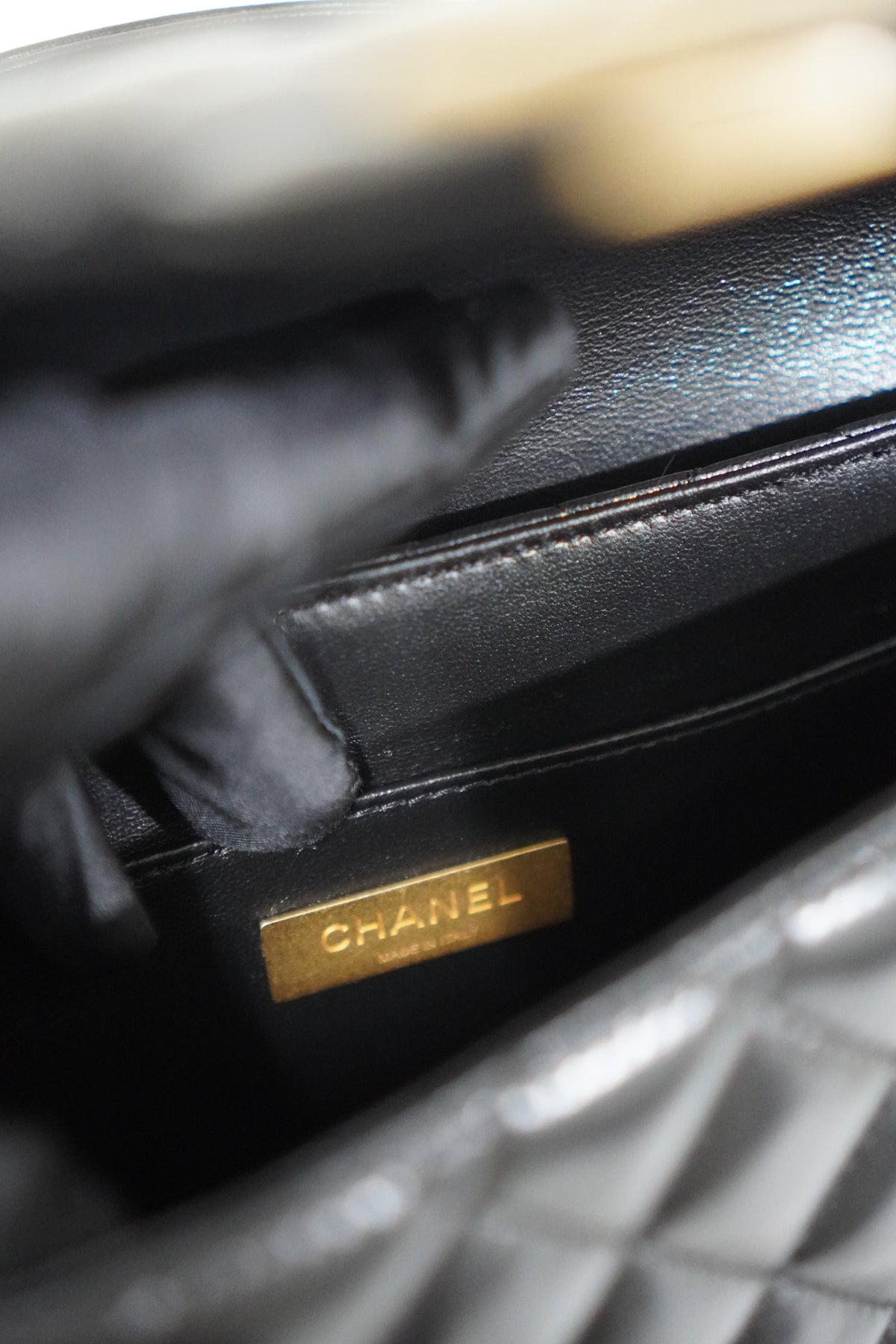 25P Top Handle Flap Bag in Black Shiny Lambskin with Gold Hardware
