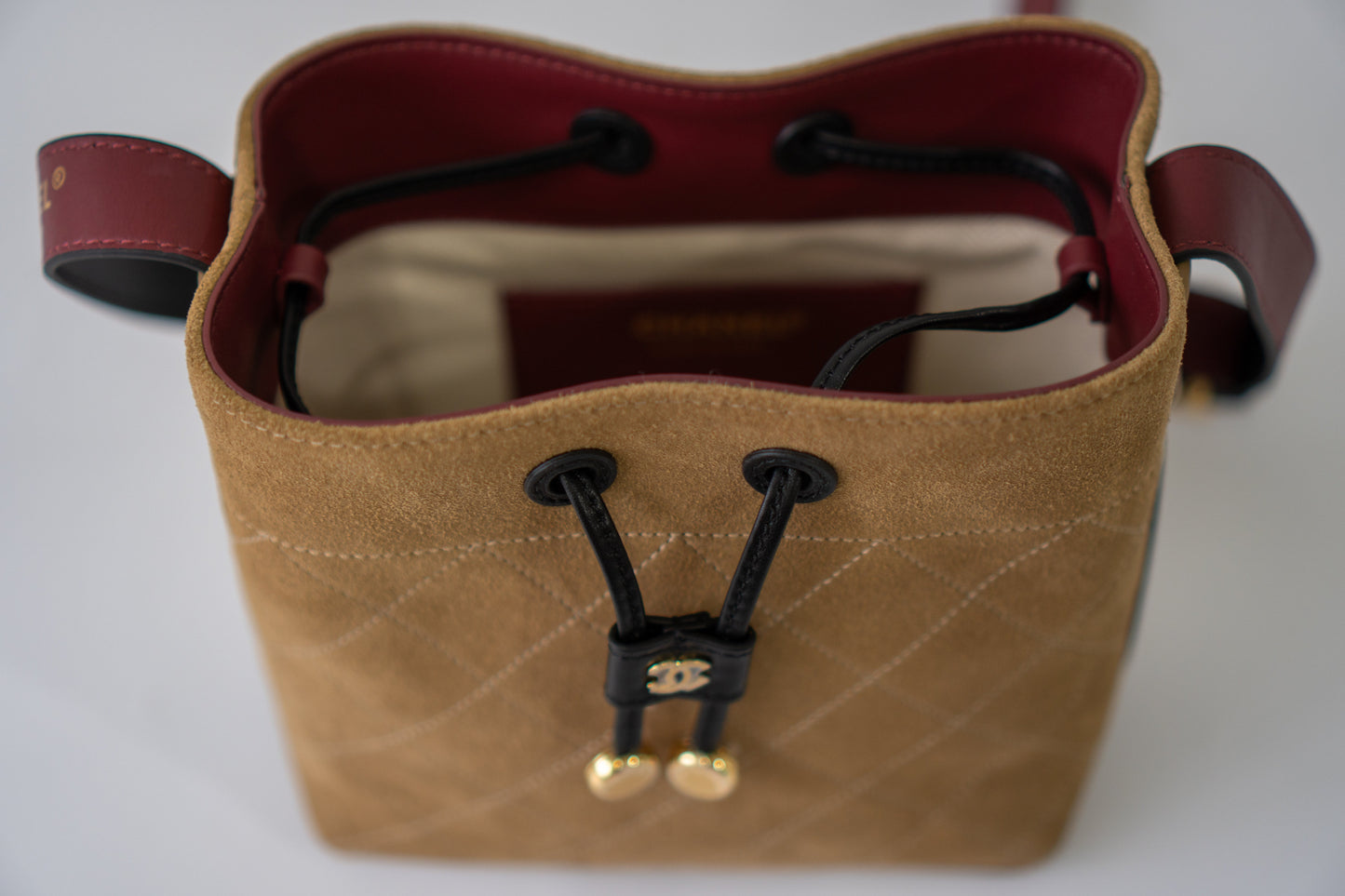 CC 26B Suede Bucket Bag – Dark Beige Suede with Gold Hardware