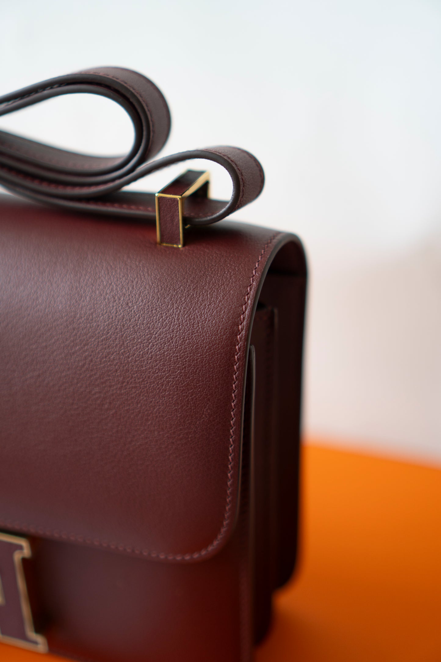 Constanc 24 – Rouge H Evercolor Leather with Gold Hardware (Leather-Covered H Clasp)