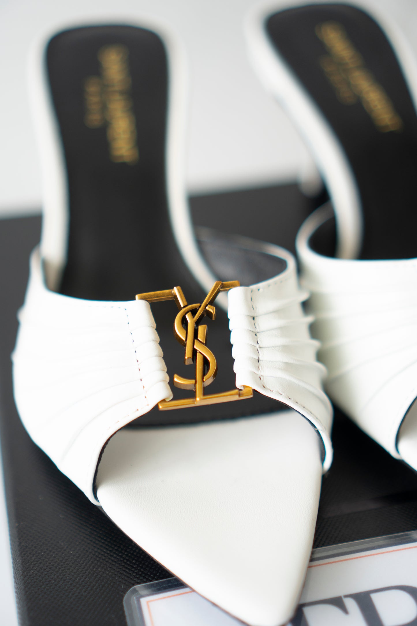 Babylone Mules – White Leather with Gold Cassandre Logo