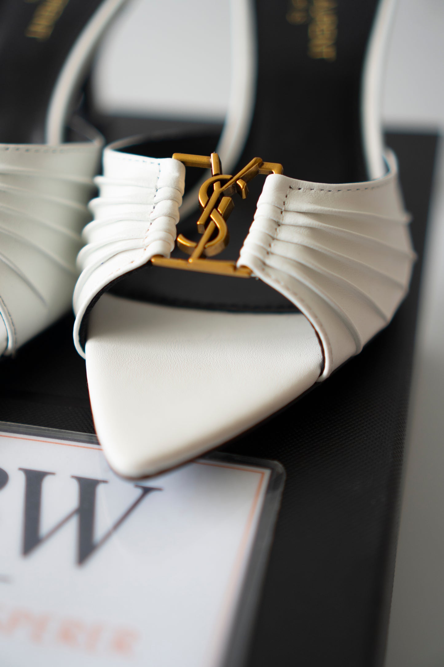 Babylone Mules – White Leather with Gold Cassandre Logo