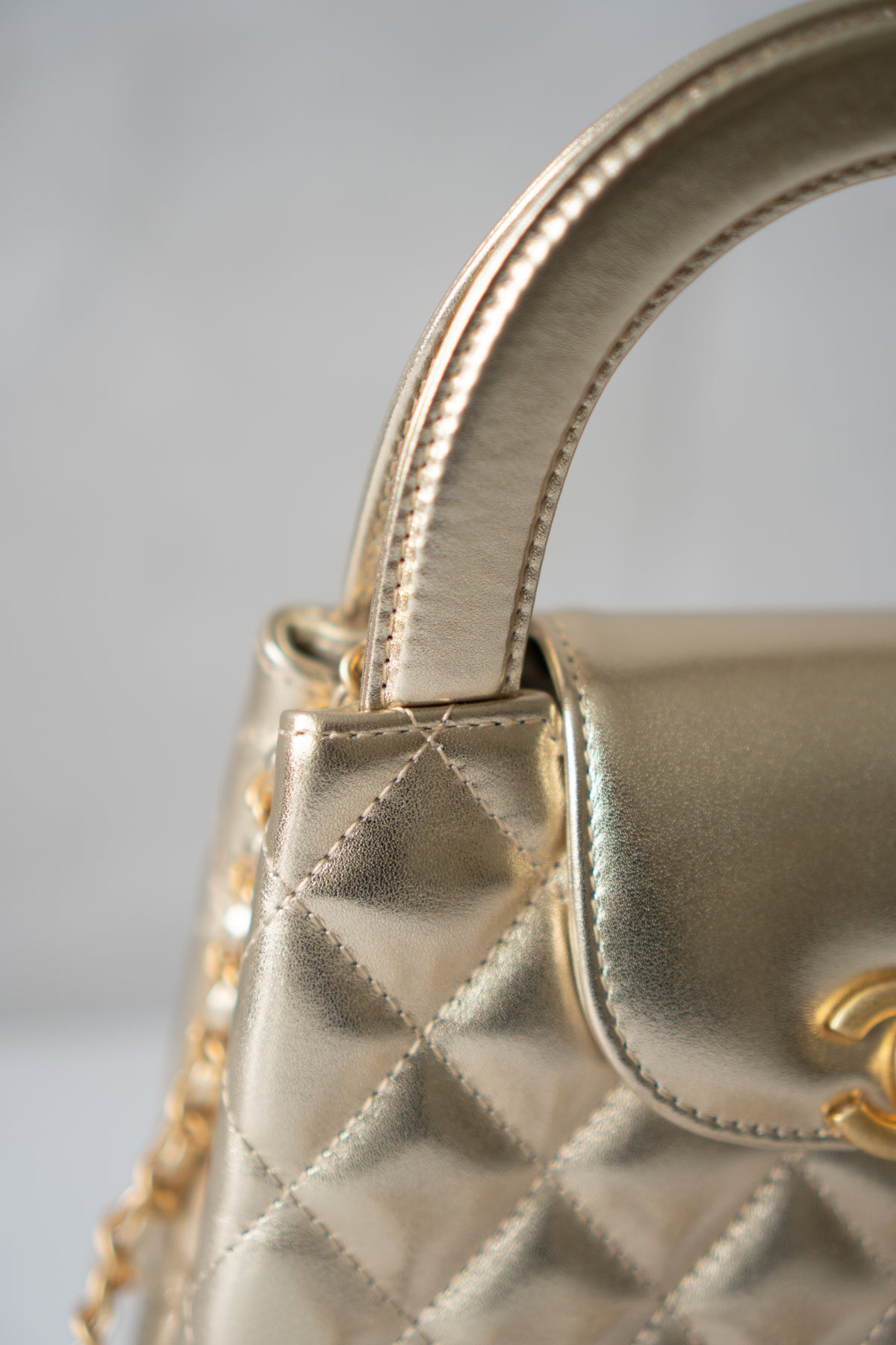 Kelly Top Handle Mini Flap – Metallic Gold Quilted Lambskin with Gold Hardware