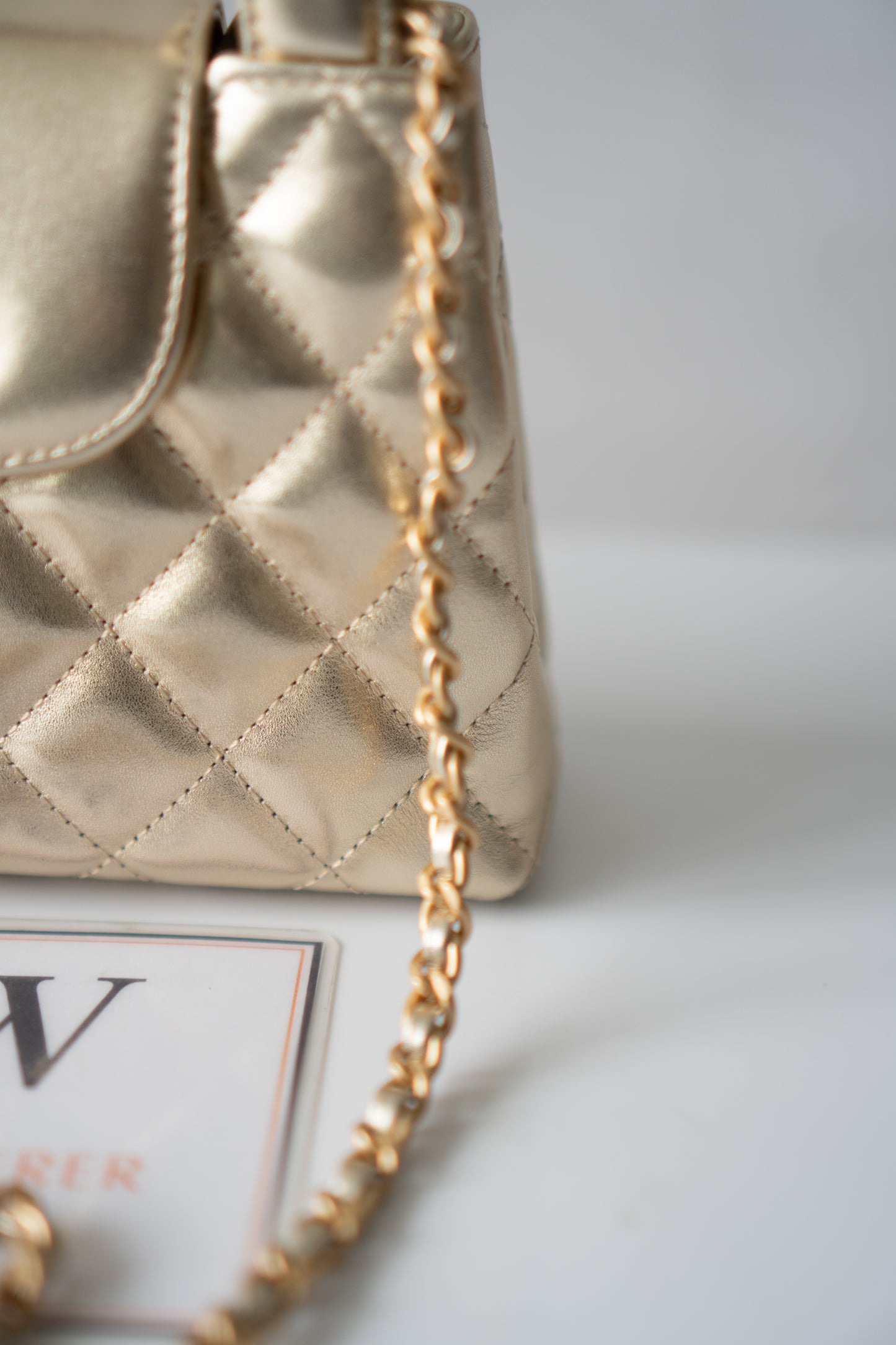 Kelly Top Handle Mini Flap – Metallic Gold Quilted Lambskin with Gold Hardware