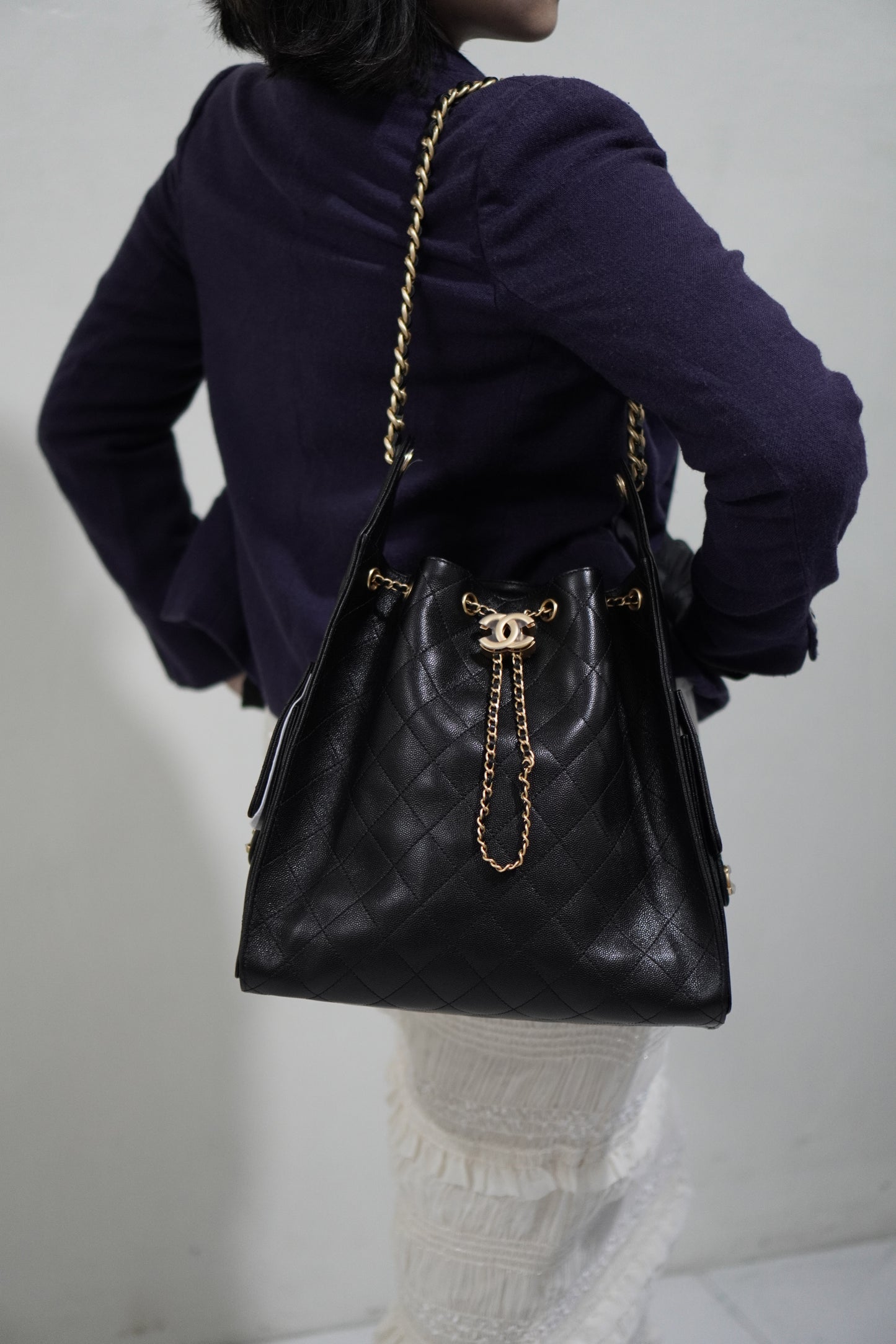 C25 Drawstring Bag in Black Caviar (Medium)