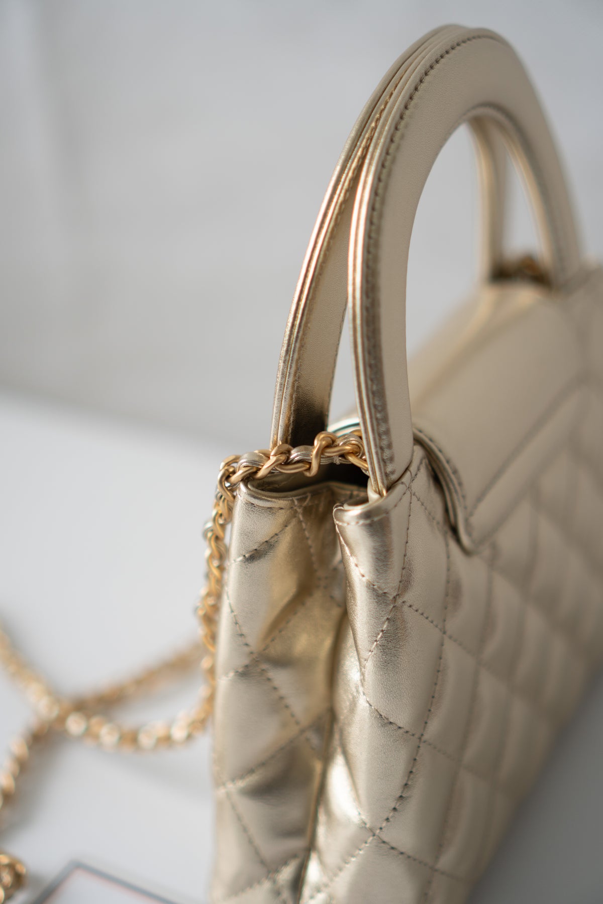 Kelly Top Handle Mini Flap – Metallic Gold Quilted Lambskin with Gold Hardware