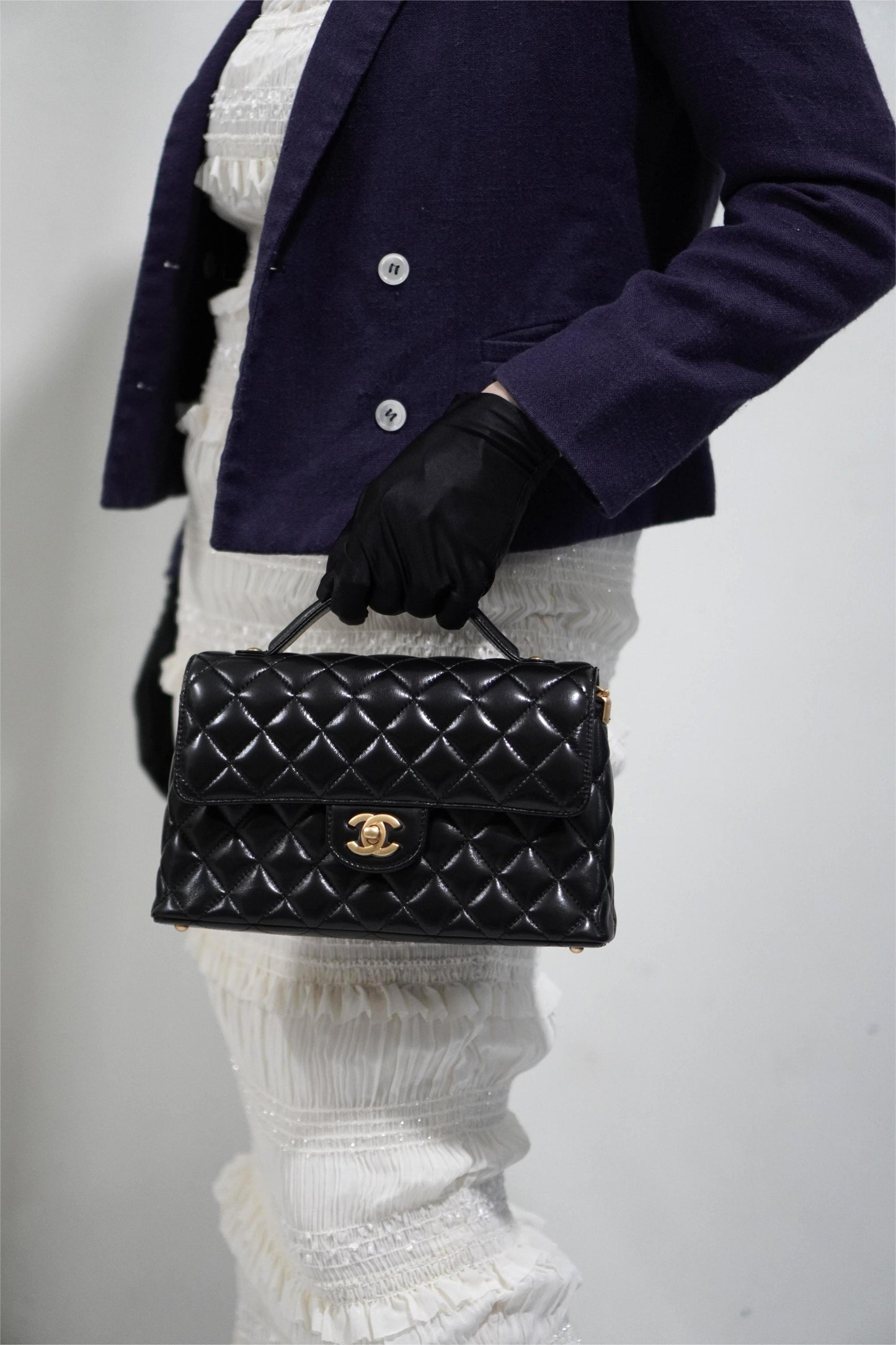 25P Top Handle Flap Bag in Black Shiny Lambskin with Gold Hardware
