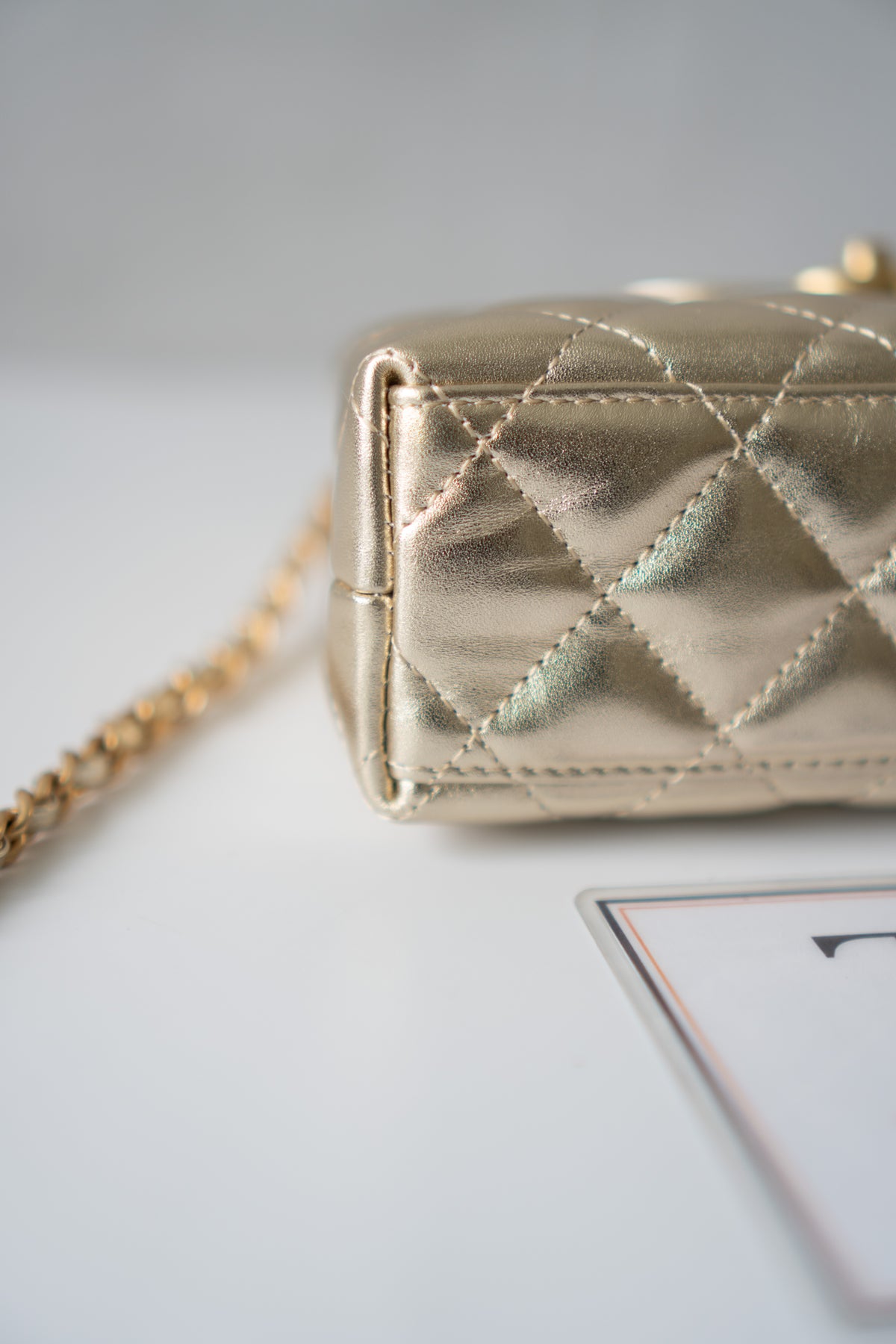 Kelly Top Handle Mini Flap – Metallic Gold Quilted Lambskin with Gold Hardware