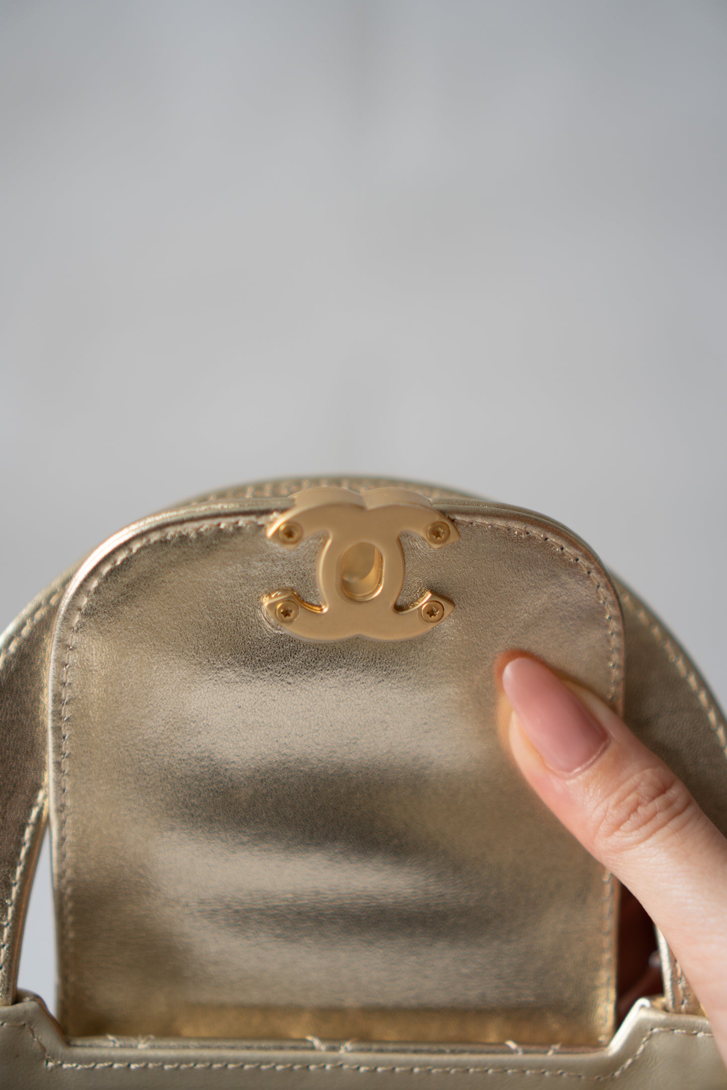Kelly Top Handle Mini Flap – Metallic Gold Quilted Lambskin with Gold Hardware