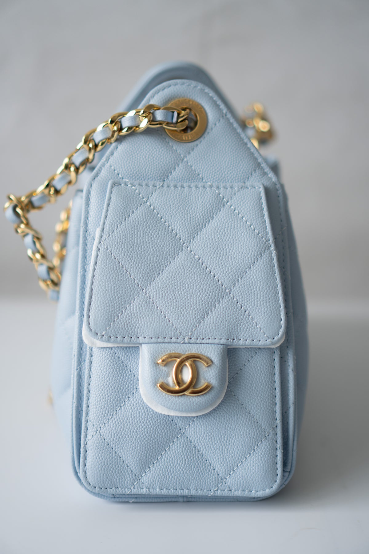 CC Drawstring Bucket Bag – Light Blue Quilted Caviar Leather with Gold Hardware