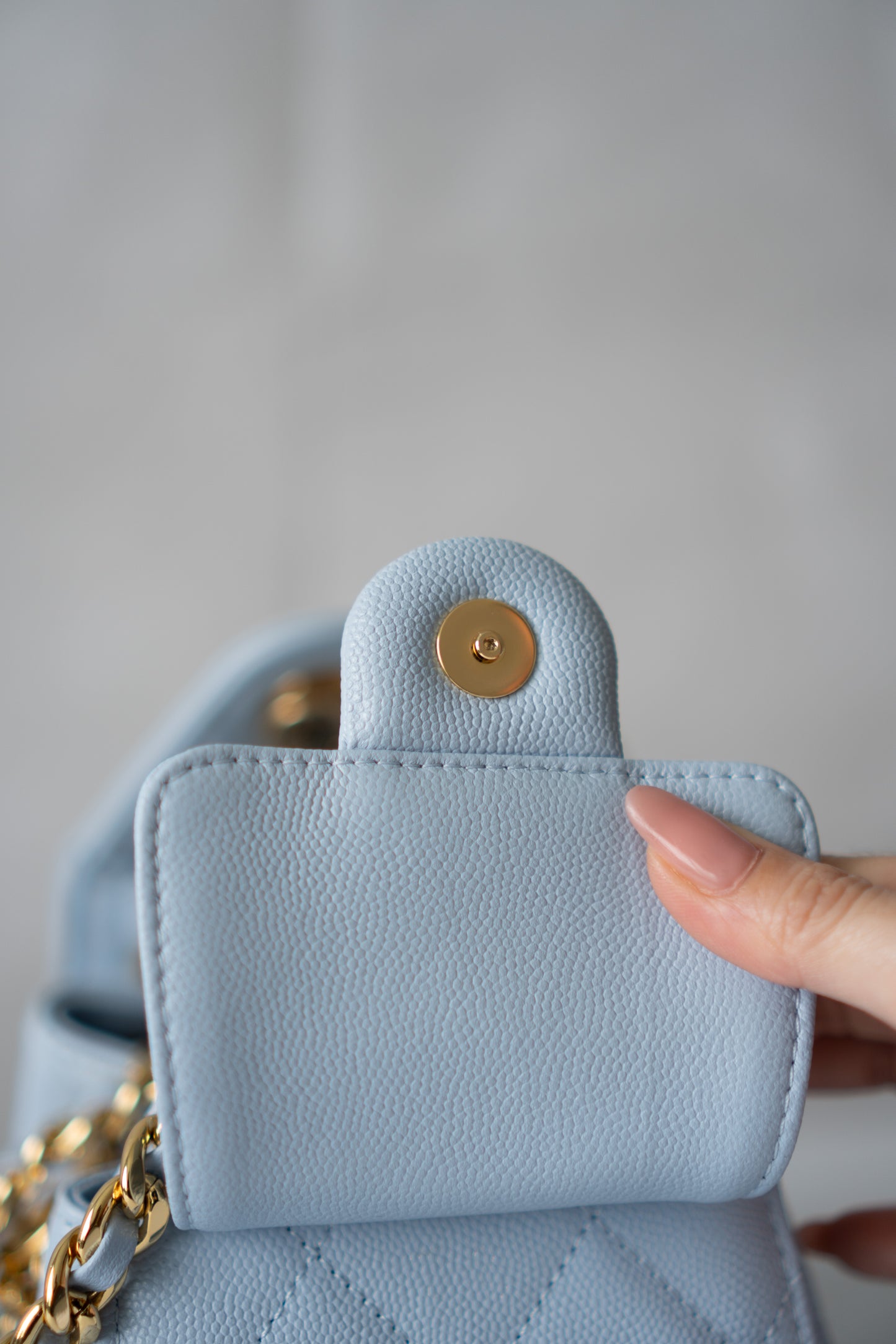 CC Drawstring Bucket Bag – Light Blue Quilted Caviar Leather with Gold Hardware
