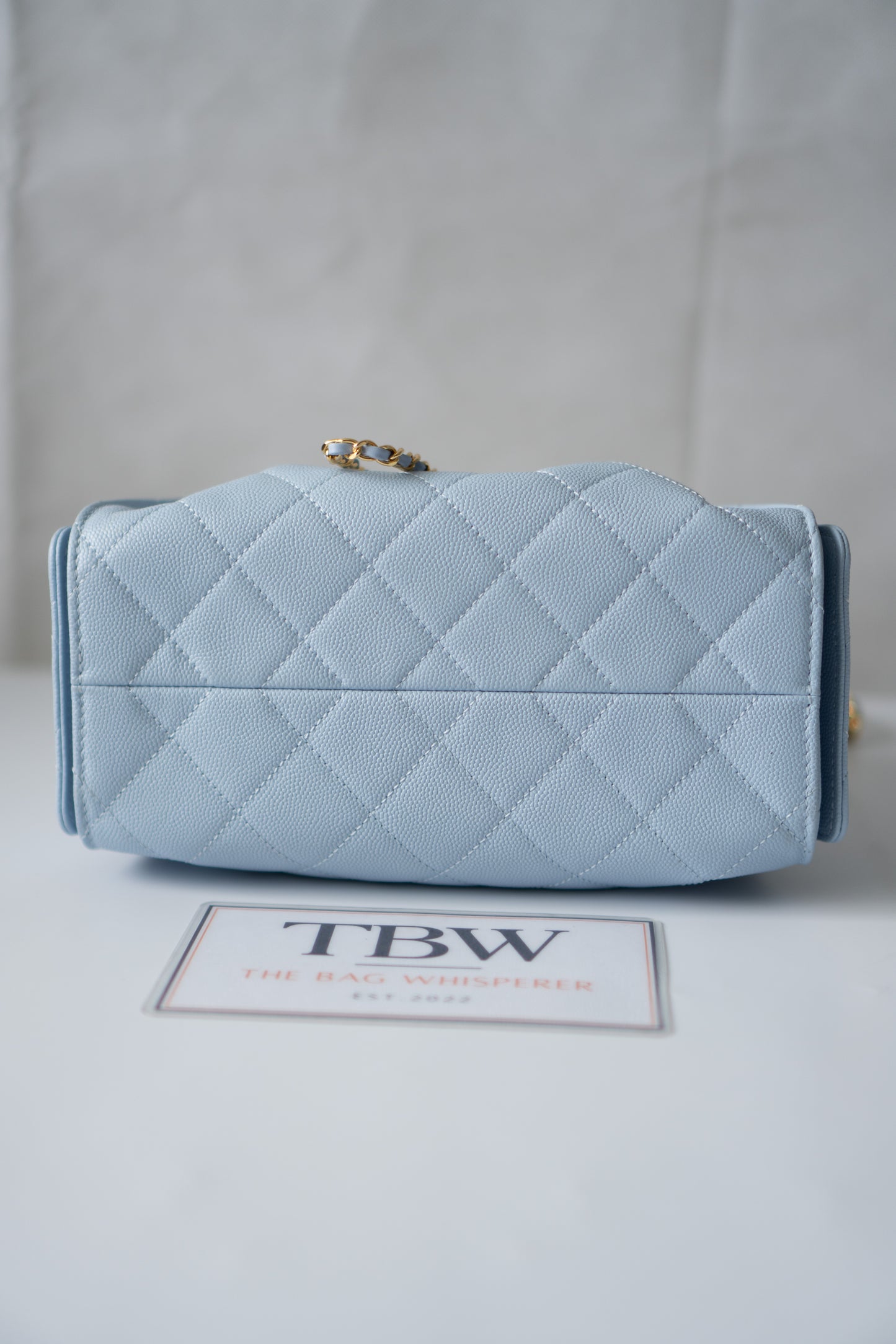 CC Drawstring Bucket Bag – Light Blue Quilted Caviar Leather with Gold Hardware