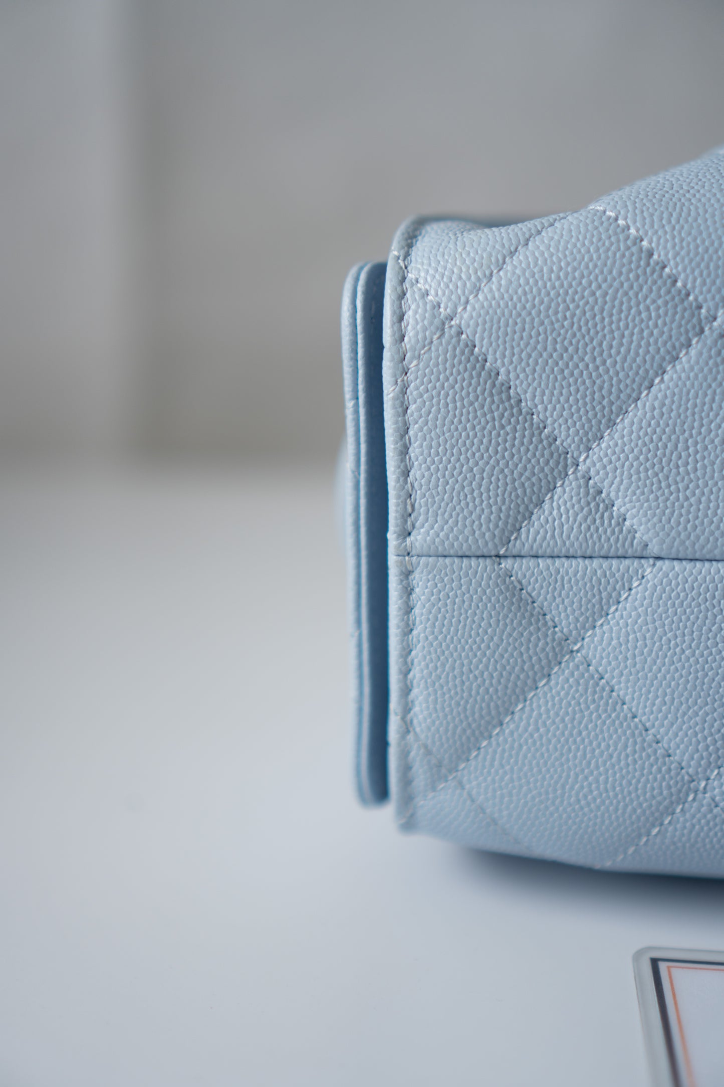 CC Drawstring Bucket Bag – Light Blue Quilted Caviar Leather with Gold Hardware