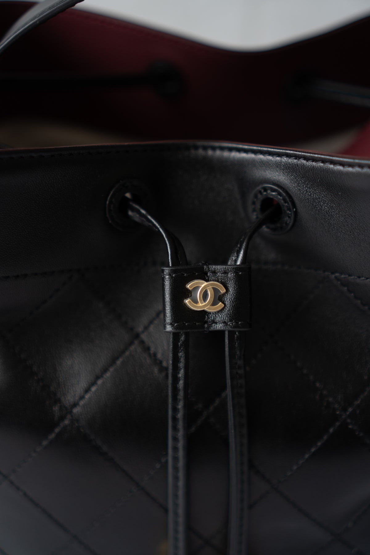 CC Small Bucket Bag – Black Quilted Lambskin with Gold Hardware