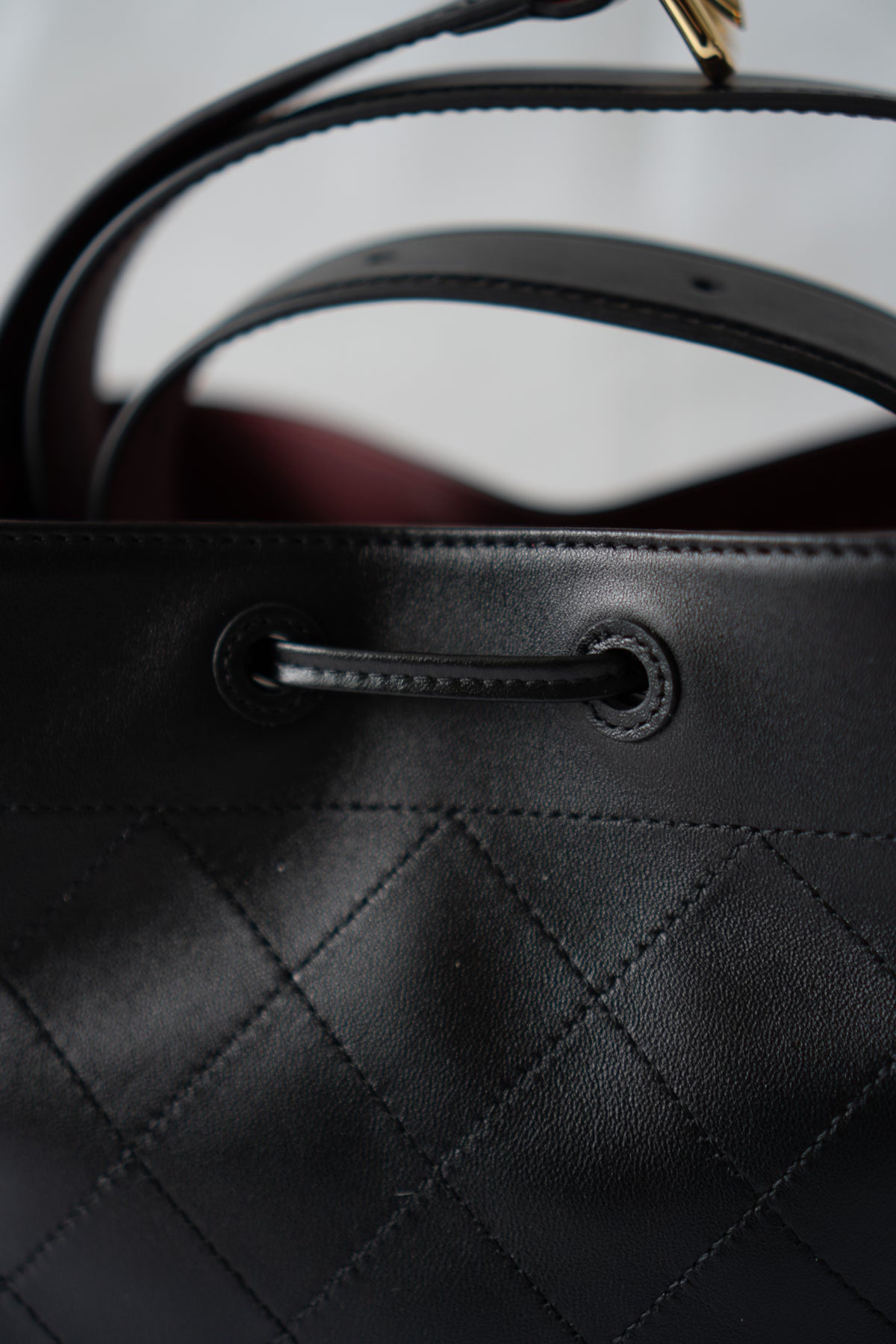 CC Small Bucket Bag – Black Quilted Lambskin with Gold Hardware