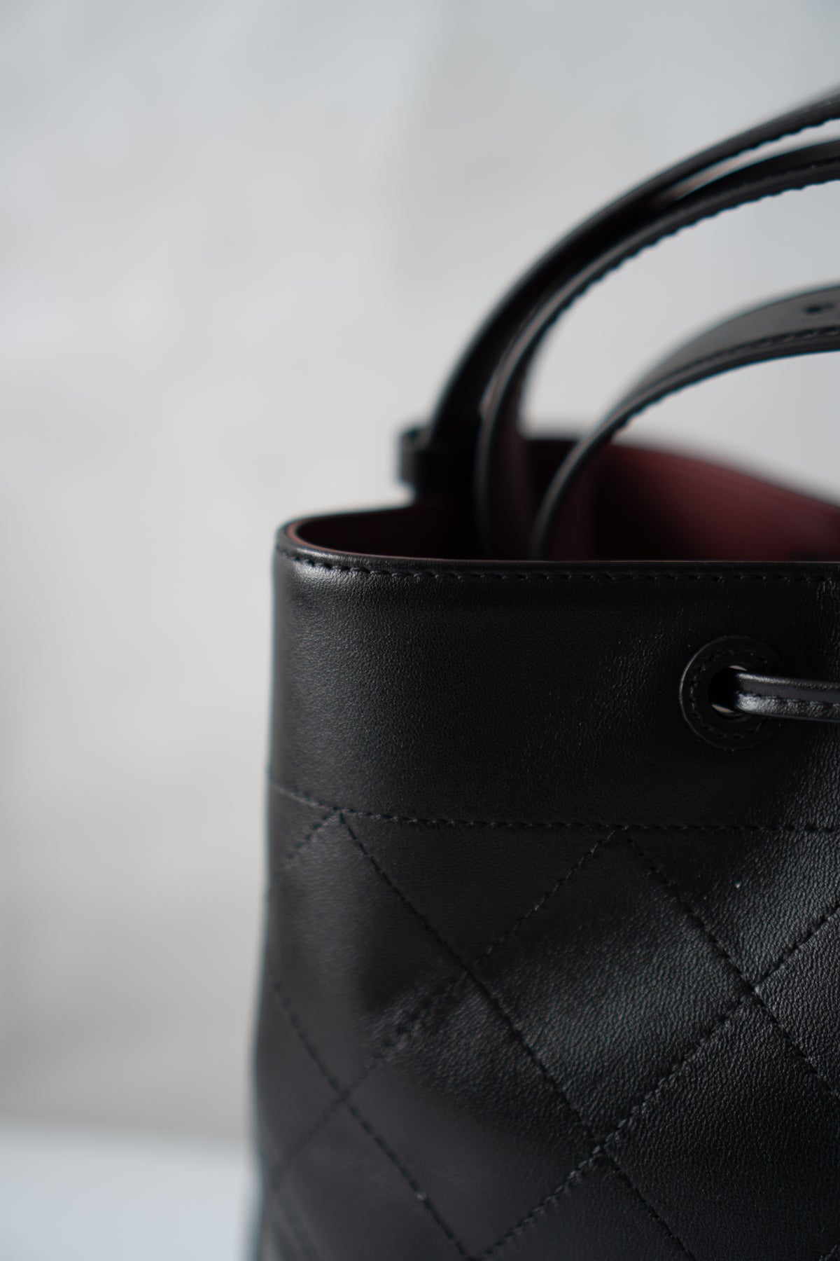 CC Small Bucket Bag – Black Quilted Lambskin with Gold Hardware