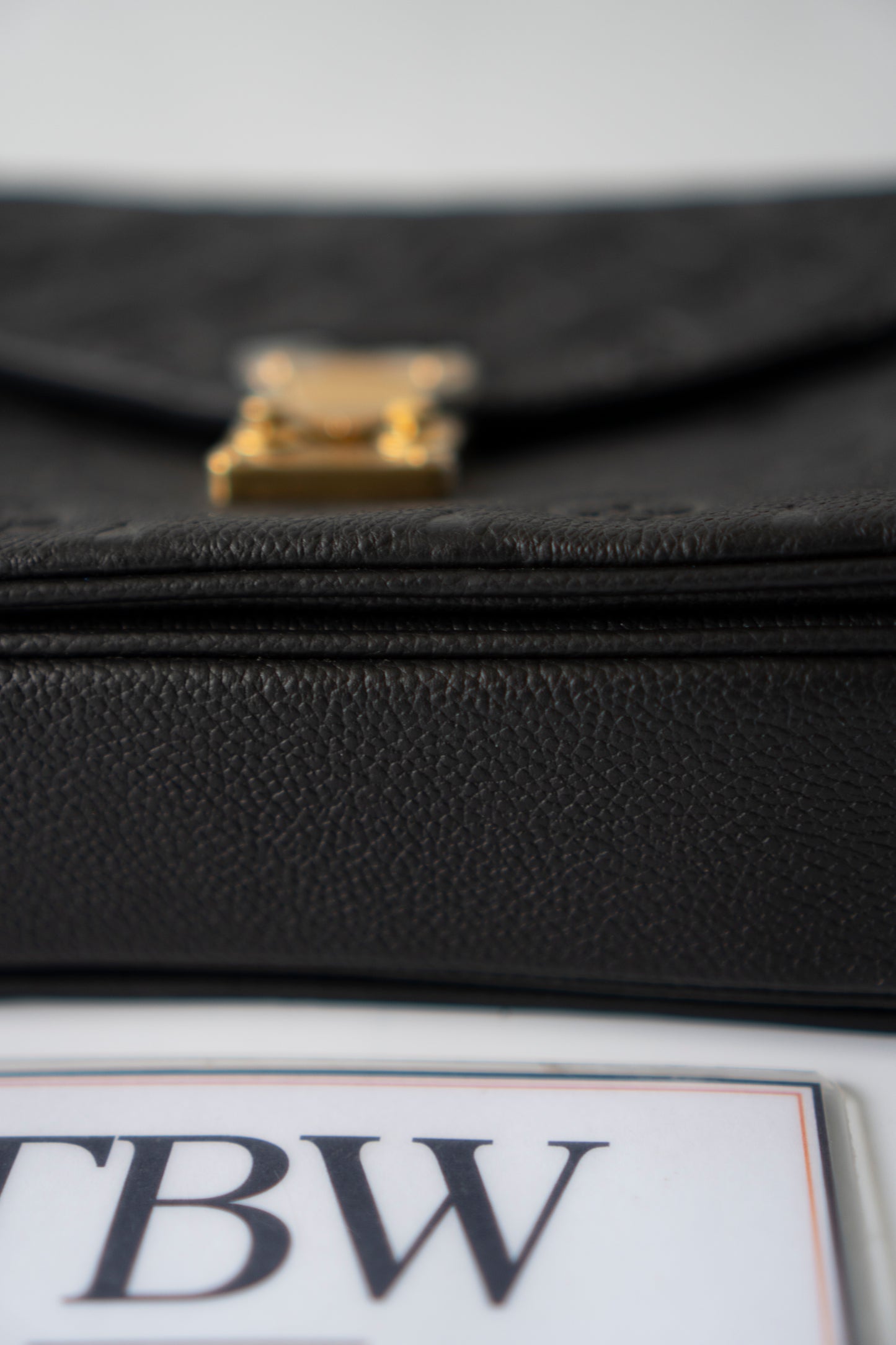 Pochette Métis – Black Monogram Empreinte Leather with Gold Hardware