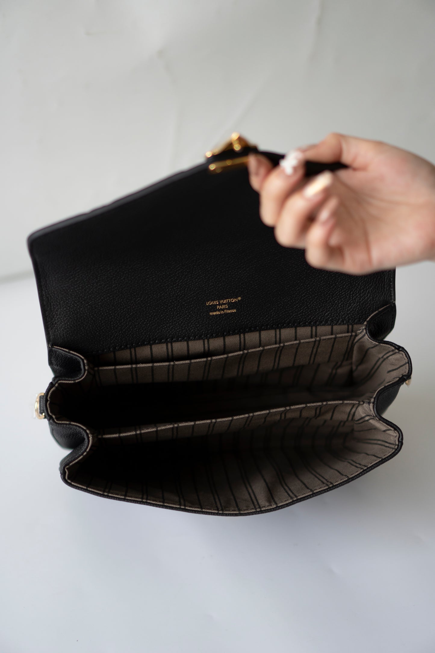 Pochette Métis – Black Monogram Empreinte Leather with Gold Hardware