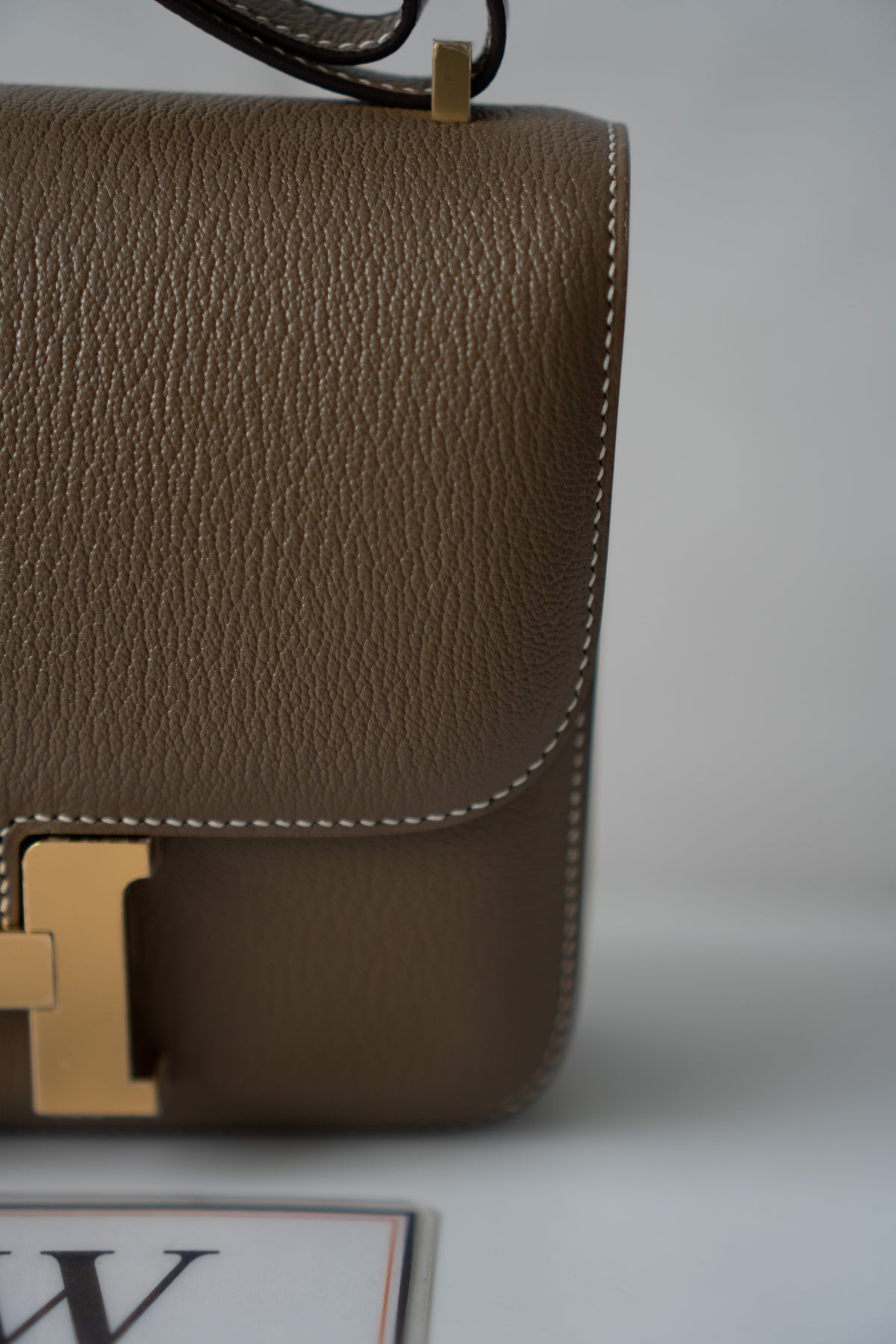 Constanc 18 – Etoupe Epsom Leather with Gold Hardware