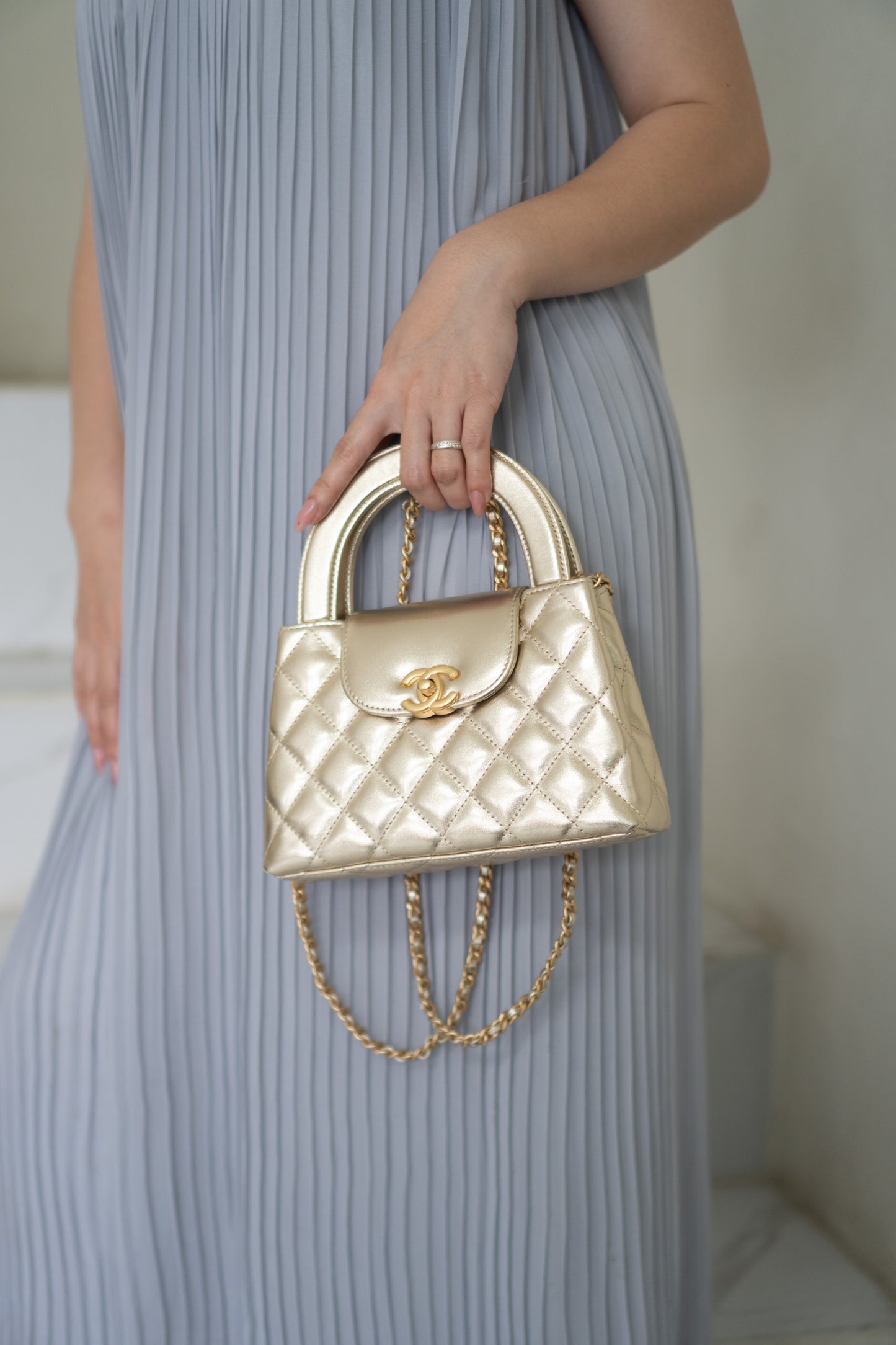 Kelly Top Handle Mini Flap – Metallic Gold Quilted Lambskin with Gold Hardware