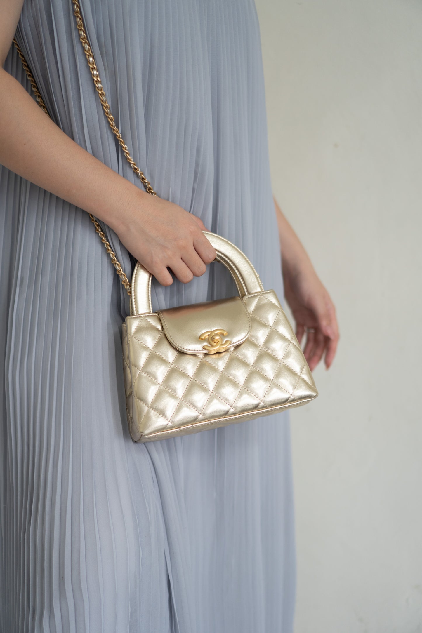Kelly Top Handle Mini Flap – Metallic Gold Quilted Lambskin with Gold Hardware