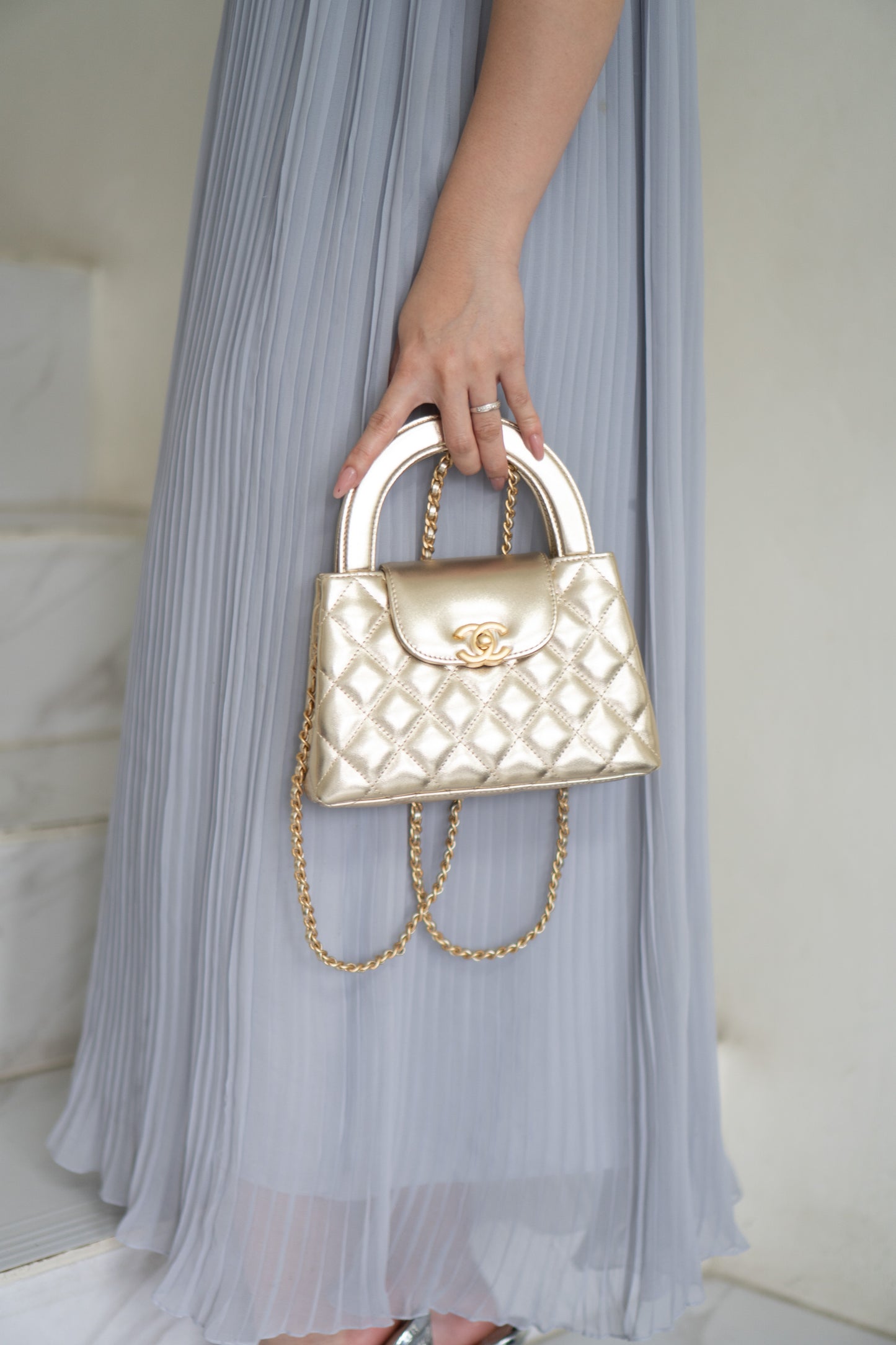 Kelly Top Handle Mini Flap – Metallic Gold Quilted Lambskin with Gold Hardware