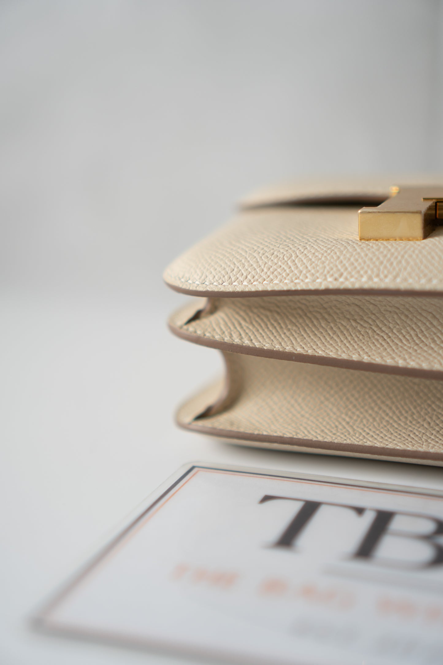 Constanc 18 – Craie Epsom Leather with Gold Hardware