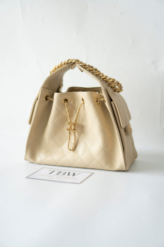 C25 Drawstring Tote in Beige Caviar Leather