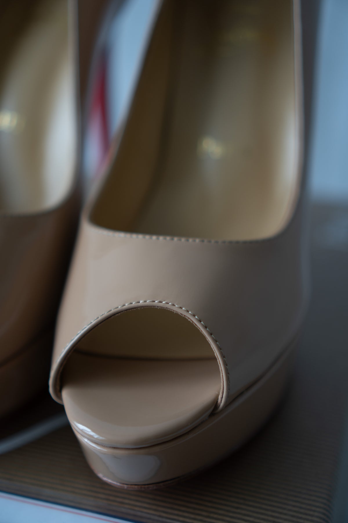 Peep-Toe Platform Pumps – Nude Patent Leather with Signature Red Soles