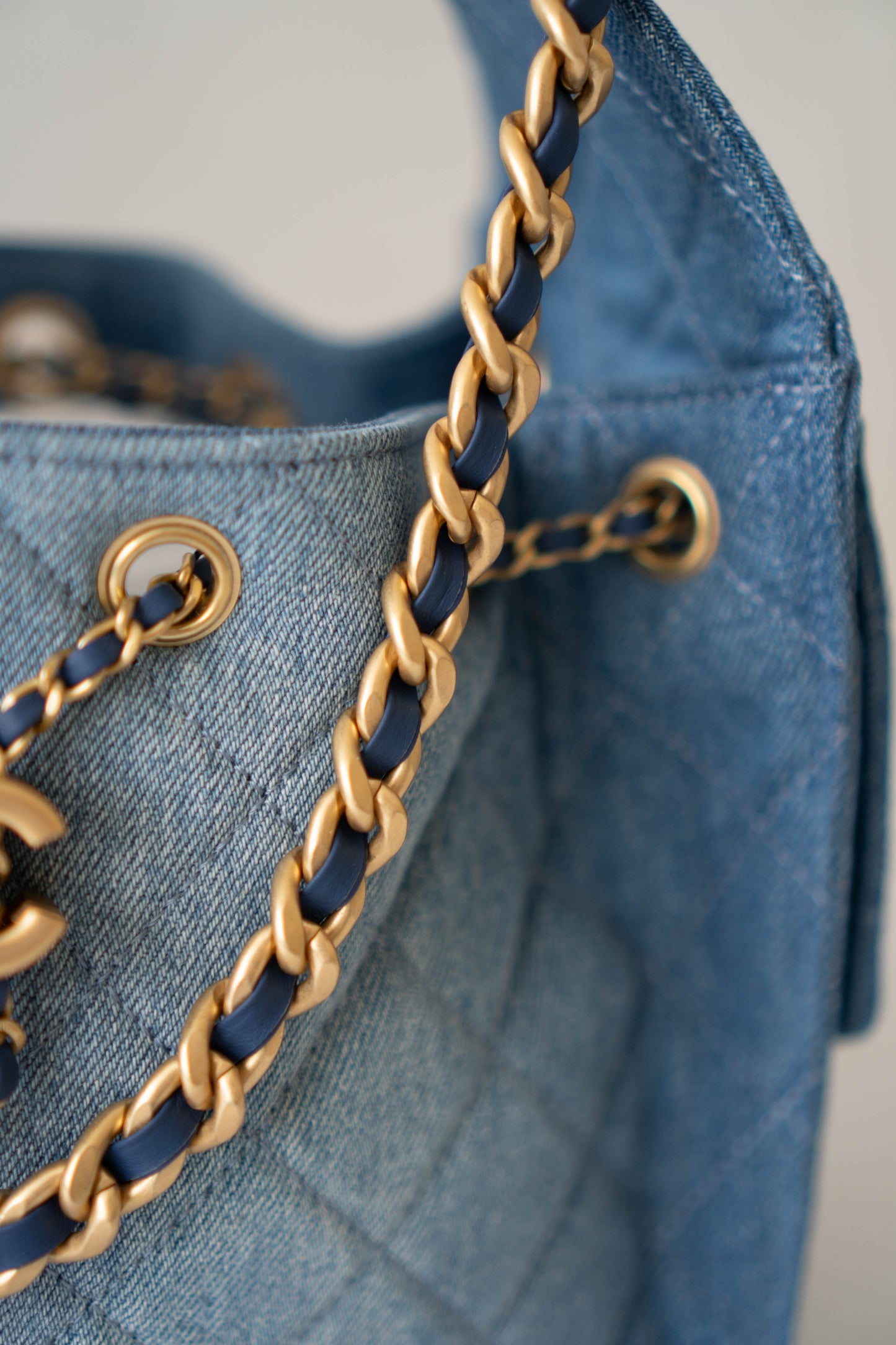 C25 Drawstring Bag – Denim Quilted Fabric with Gold Hardware (25s Collection)