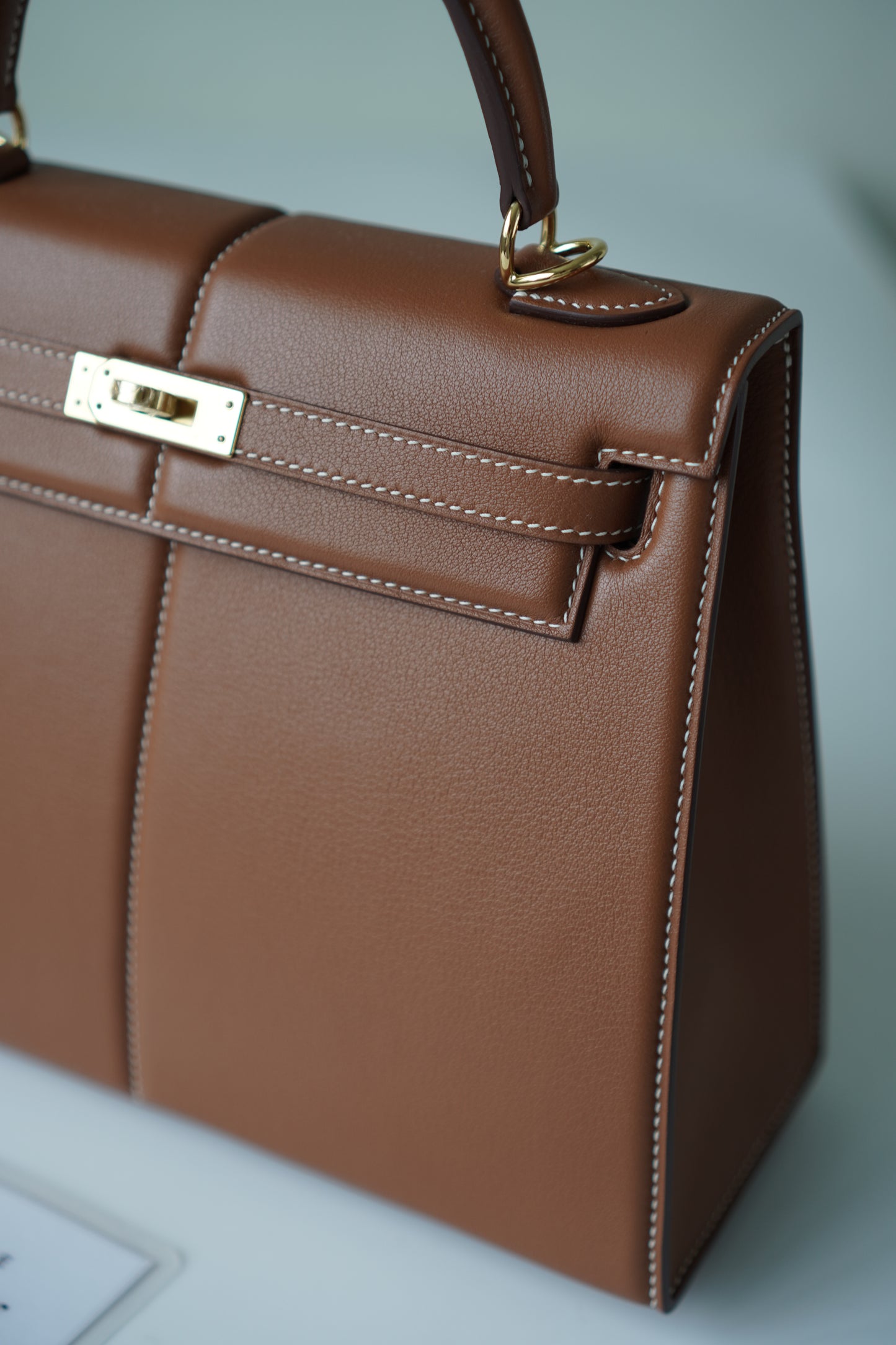 Kelly 25 Padded in Gold Swift