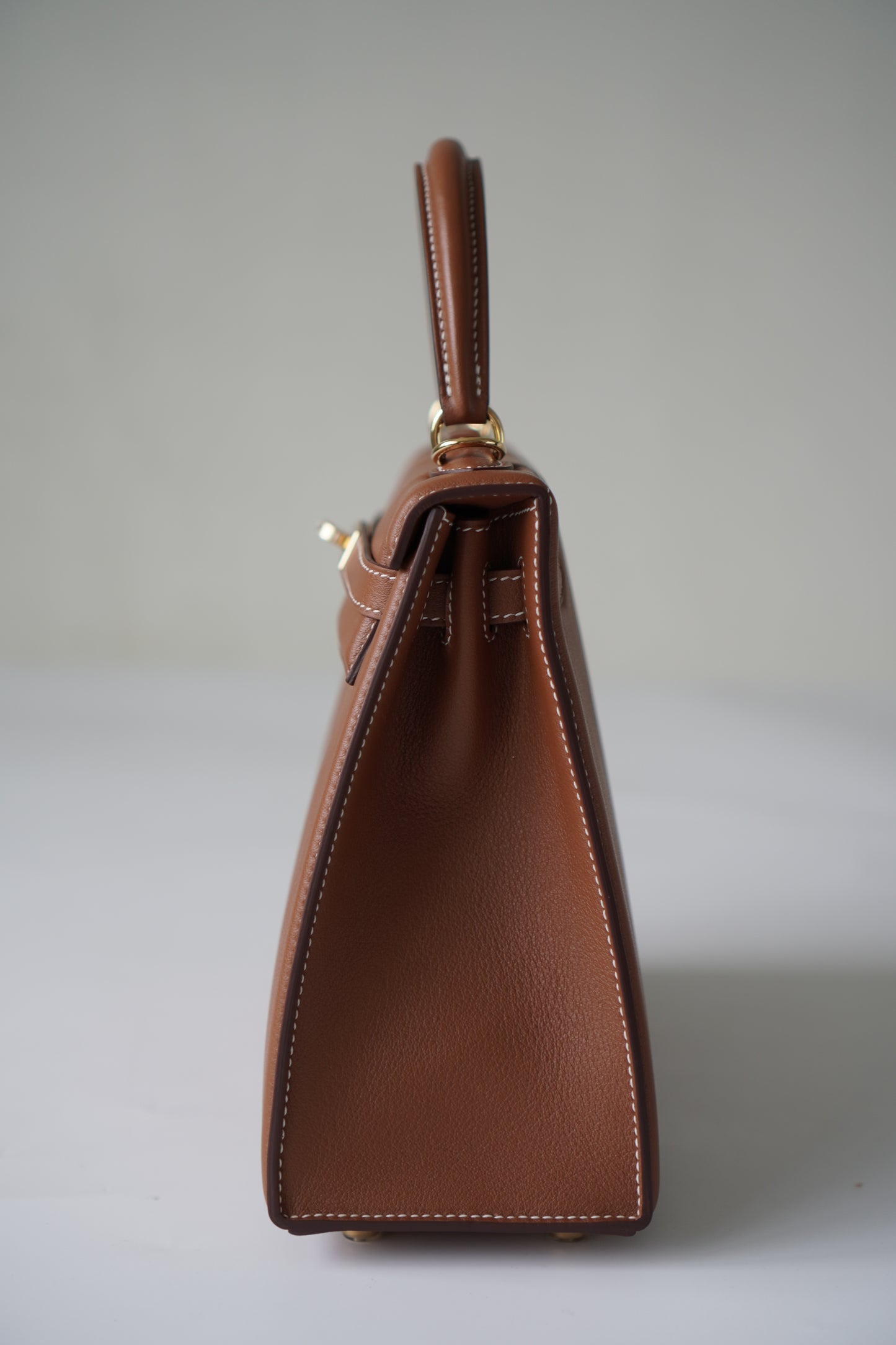 Kelly 25 Padded in Gold Swift