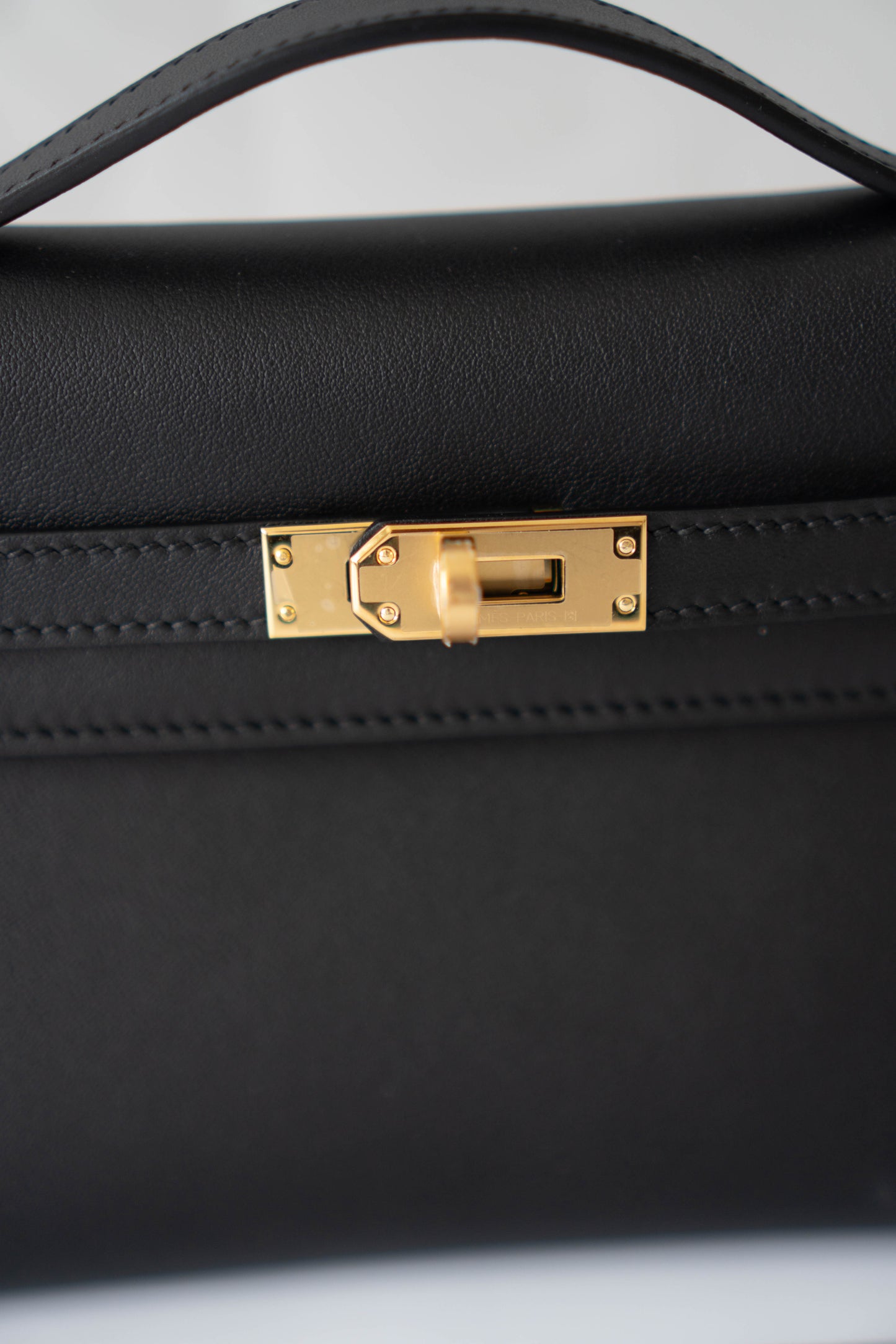 Mini Pochette – Black Swift Leather with Gold Hardware