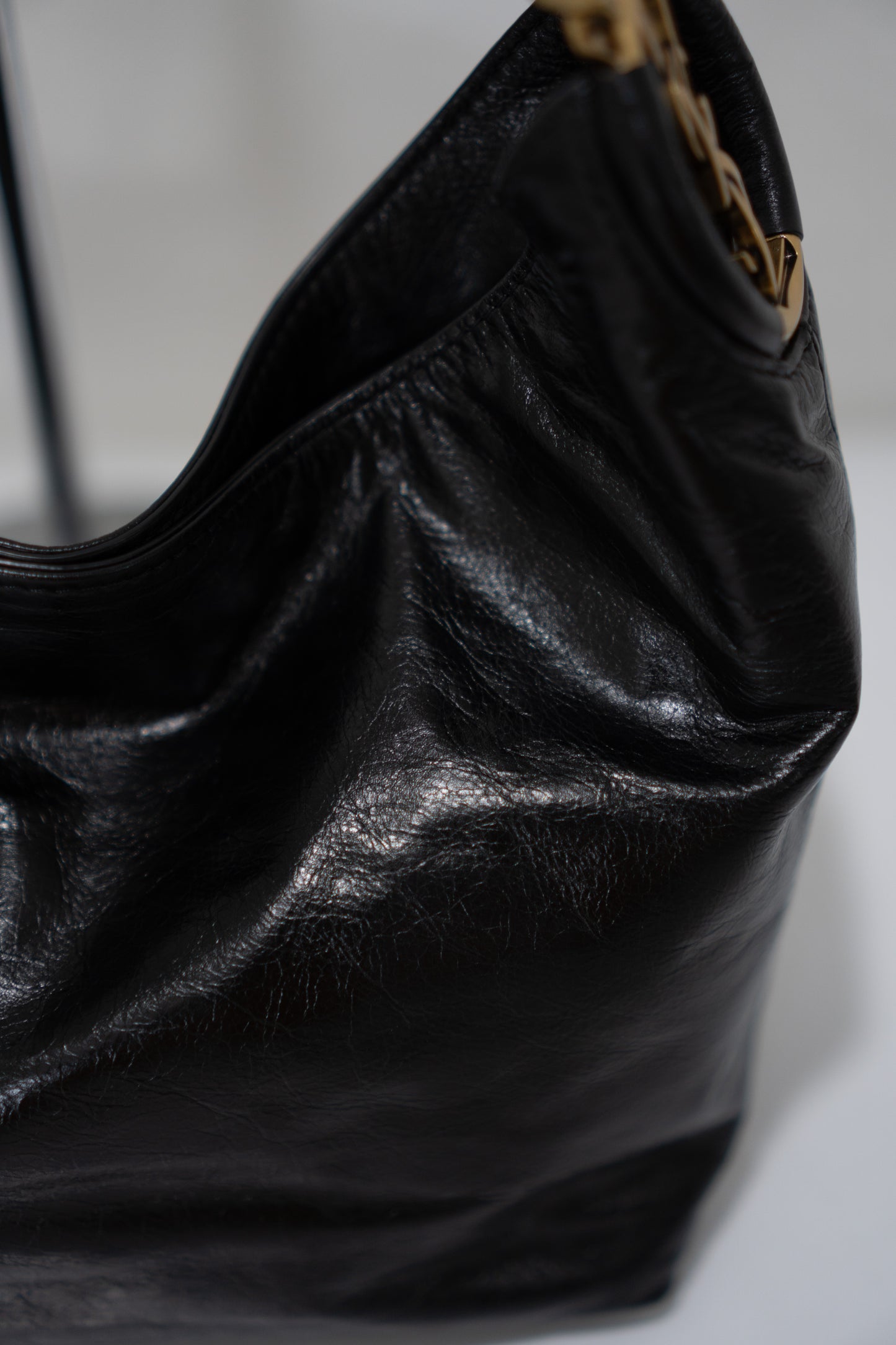 Hortense Small Hobo – Black Shiny Crinkled Leather with Bronze Hardware